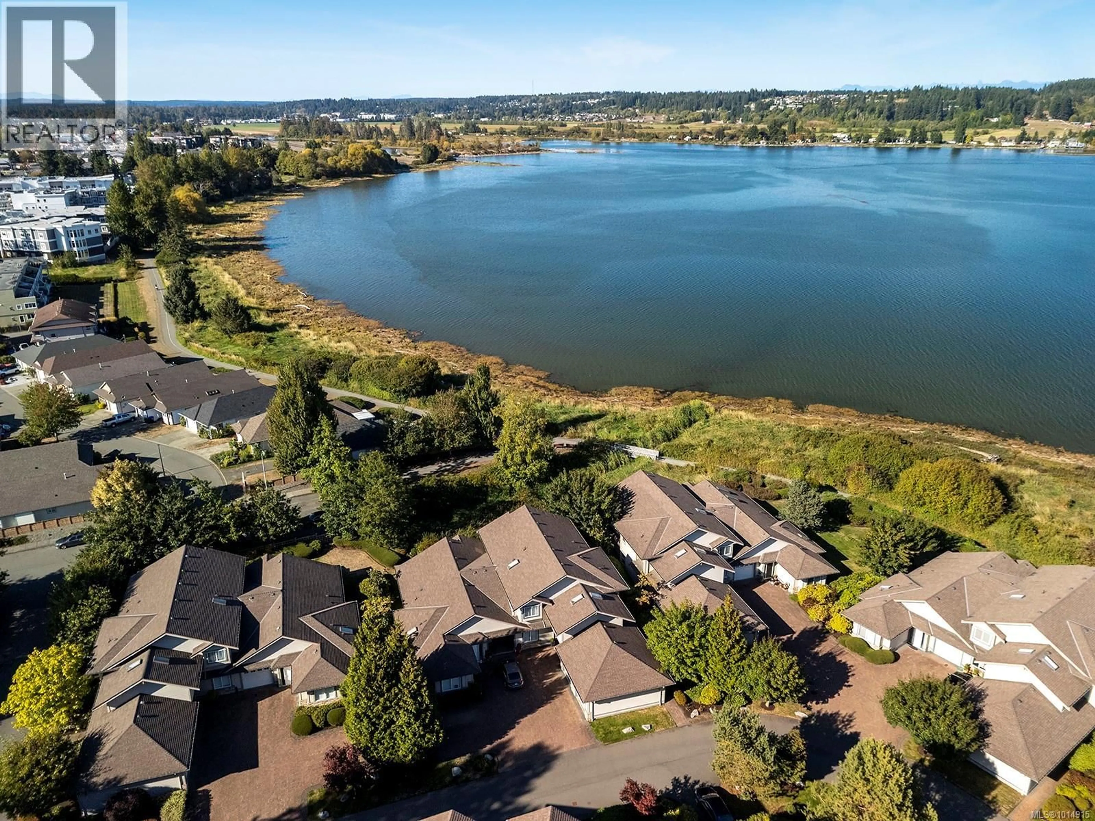 A pic from outside/outdoor area/front of a property/back of a property/a pic from drone, water/lake/river/ocean view for 5 - 199 31ST STREET, Courtenay British Columbia V9N8X1