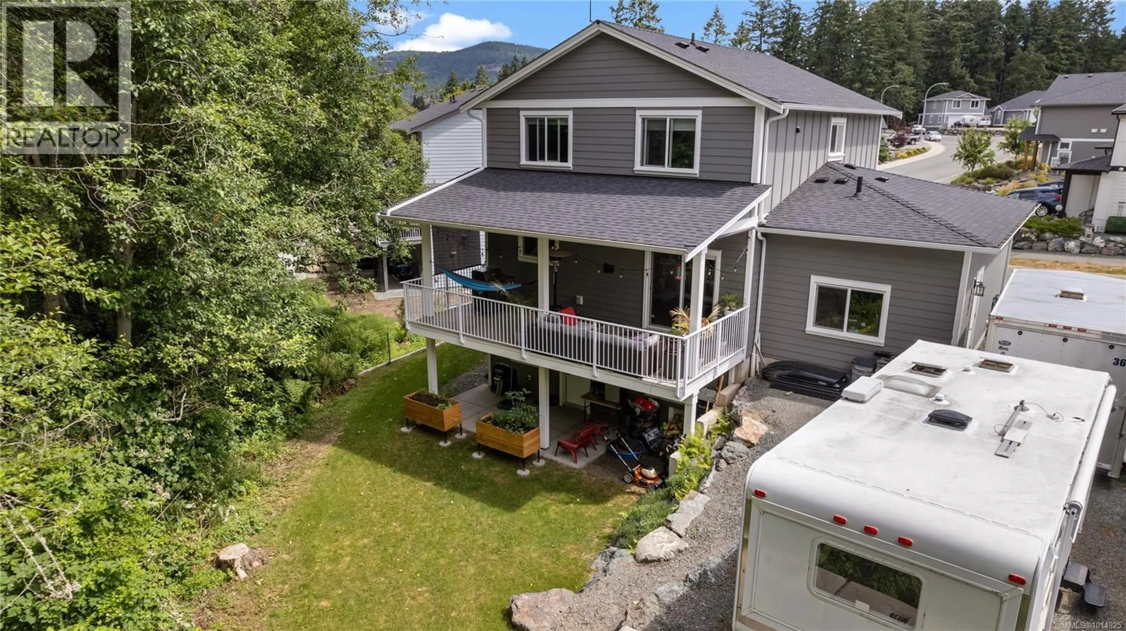 A pic from outside/outdoor area/front of a property/back of a property/a pic from drone, mountain view for 2052 ERNEST LANE, Duncan British Columbia V9L5R4