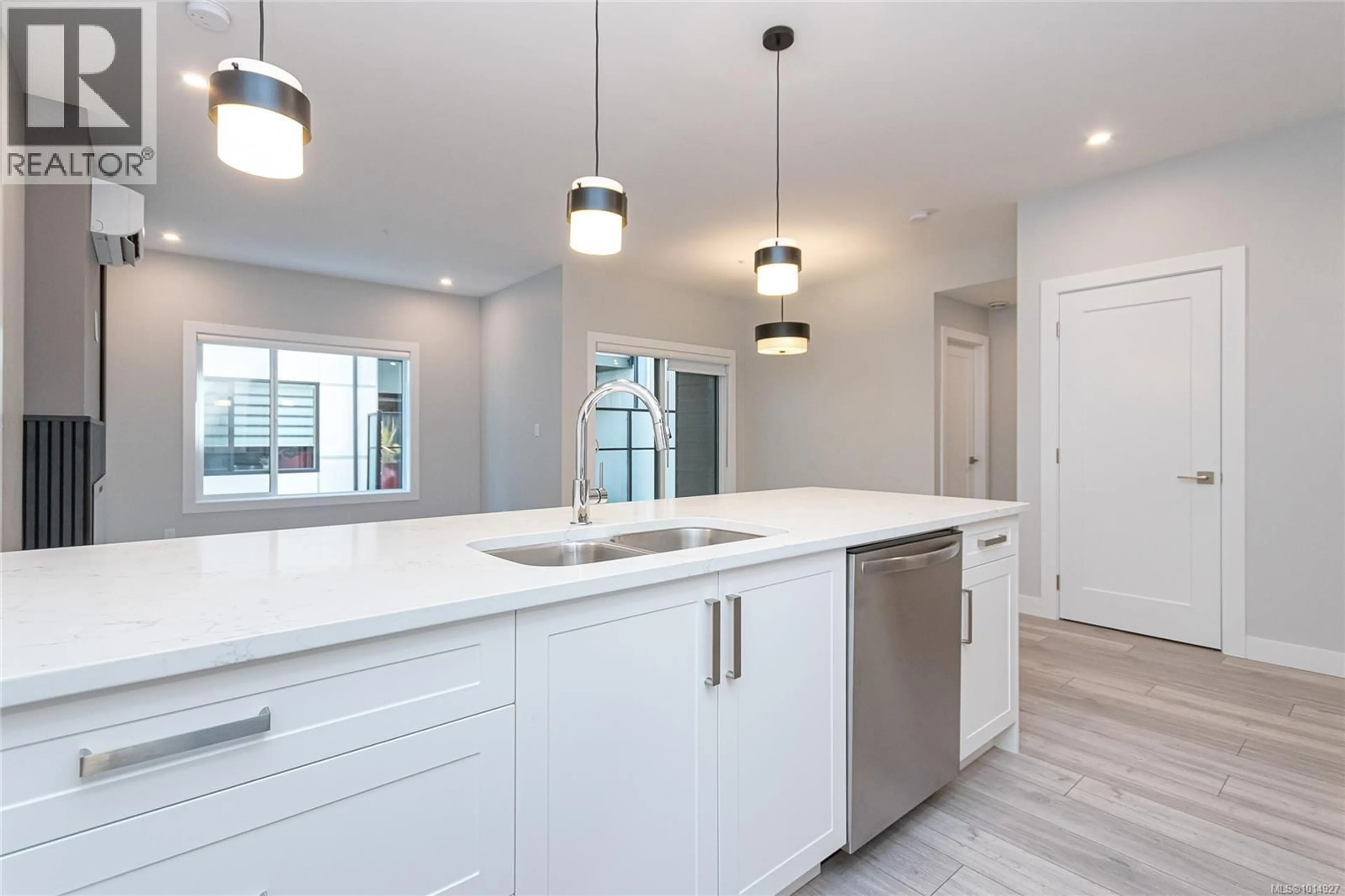 Open concept kitchen, ceramic/tile floor for 302 - 924 JENKINS AVENUE, Langford British Columbia V9B2N7