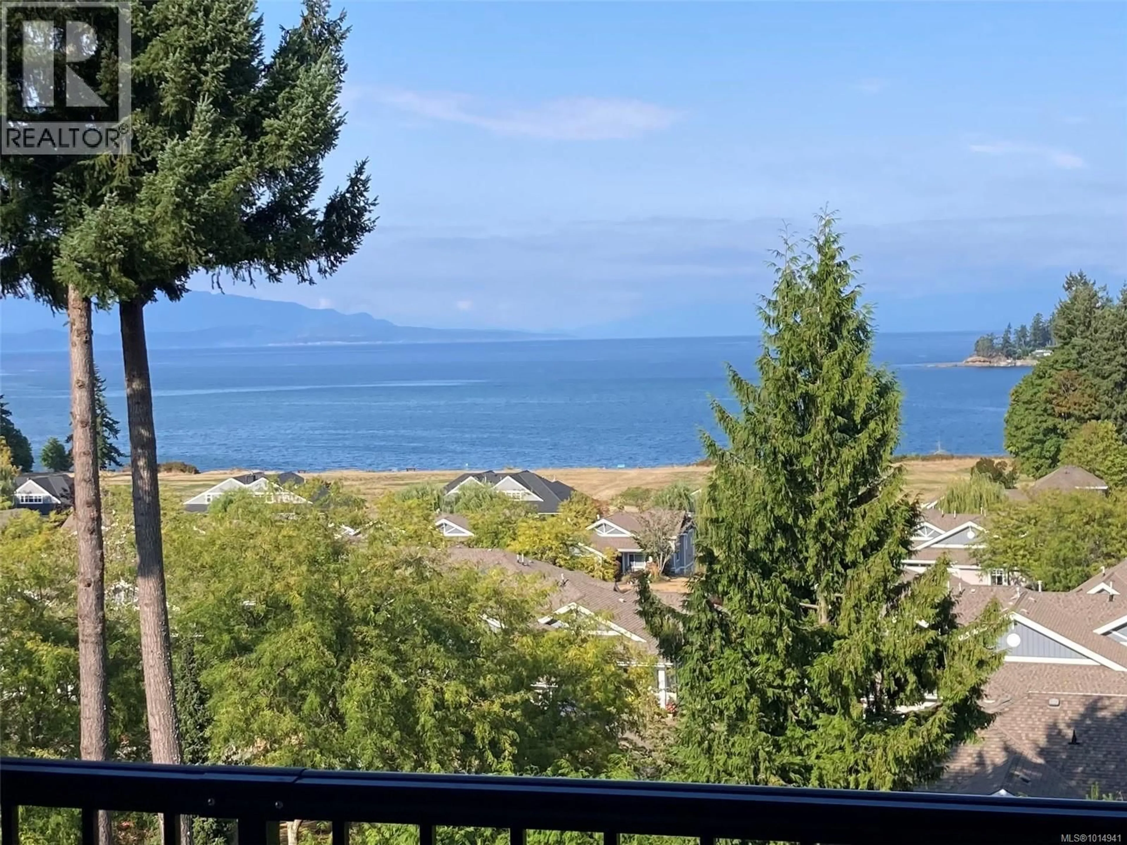 A pic from outside/outdoor area/front of a property/back of a property/a pic from drone, water/lake/river/ocean view for 402 - 1325 CAPE COD DRIVE, Parksville British Columbia V9P2Y8