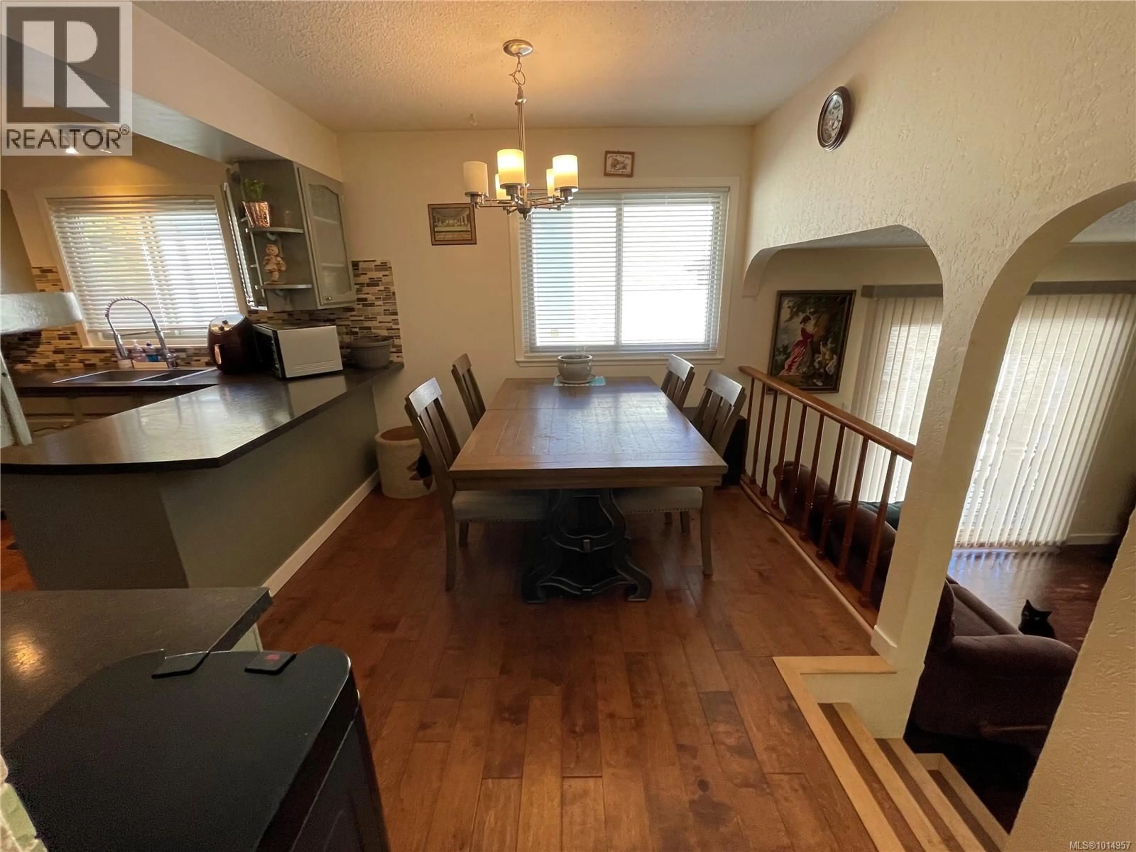 Dining room, wood/laminate floor for 7130 HIGHLAND DRIVE, Port Hardy British Columbia V0N2P0