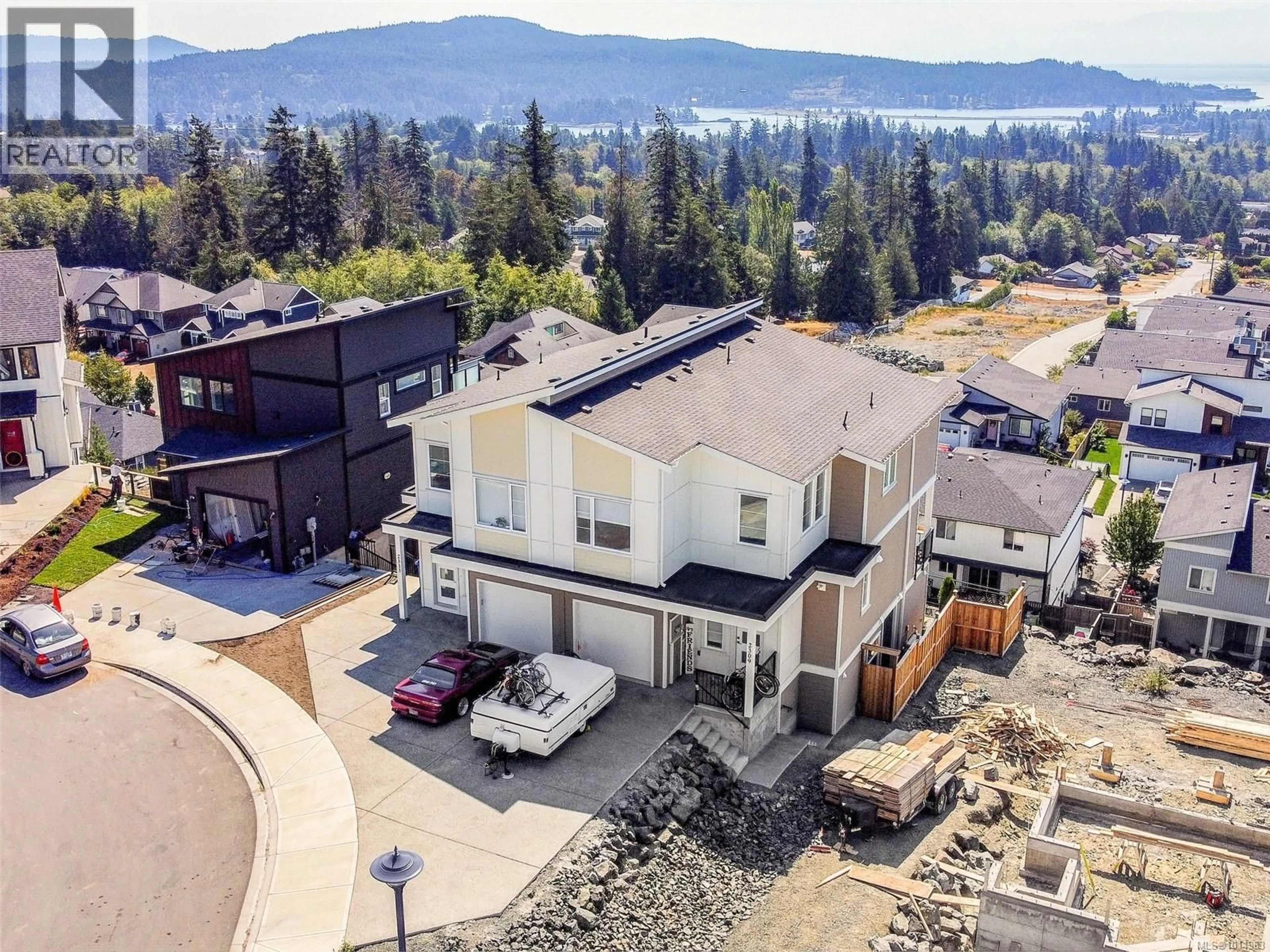 A pic from outside/outdoor area/front of a property/back of a property/a pic from drone, mountain view for 2311 HUDSON TERRACE, Sooke British Columbia V9Z1R2