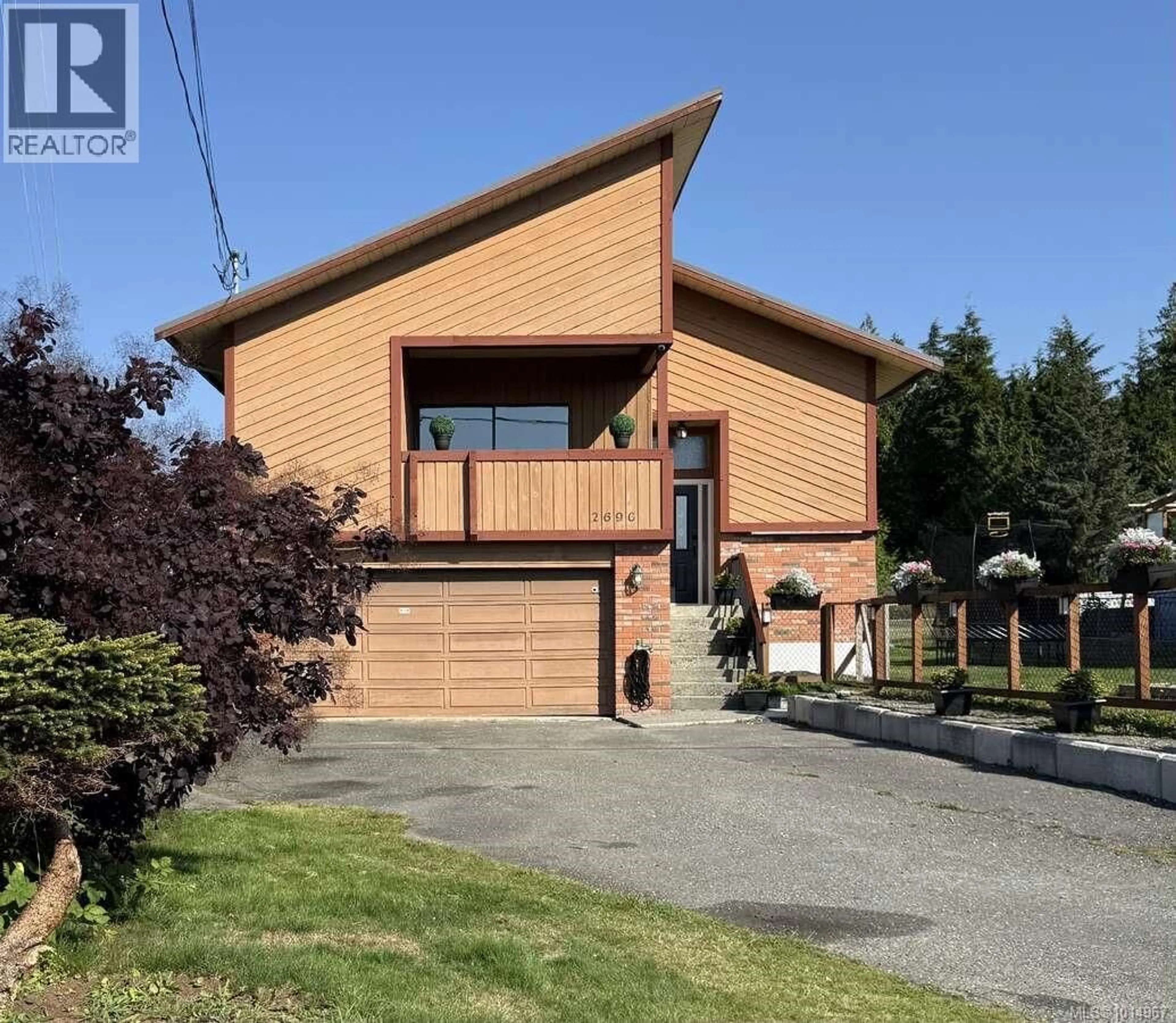 Home with brick exterior material, street for 2696 BROCKINGTON PLACE, Port McNeill British Columbia V0N2R0