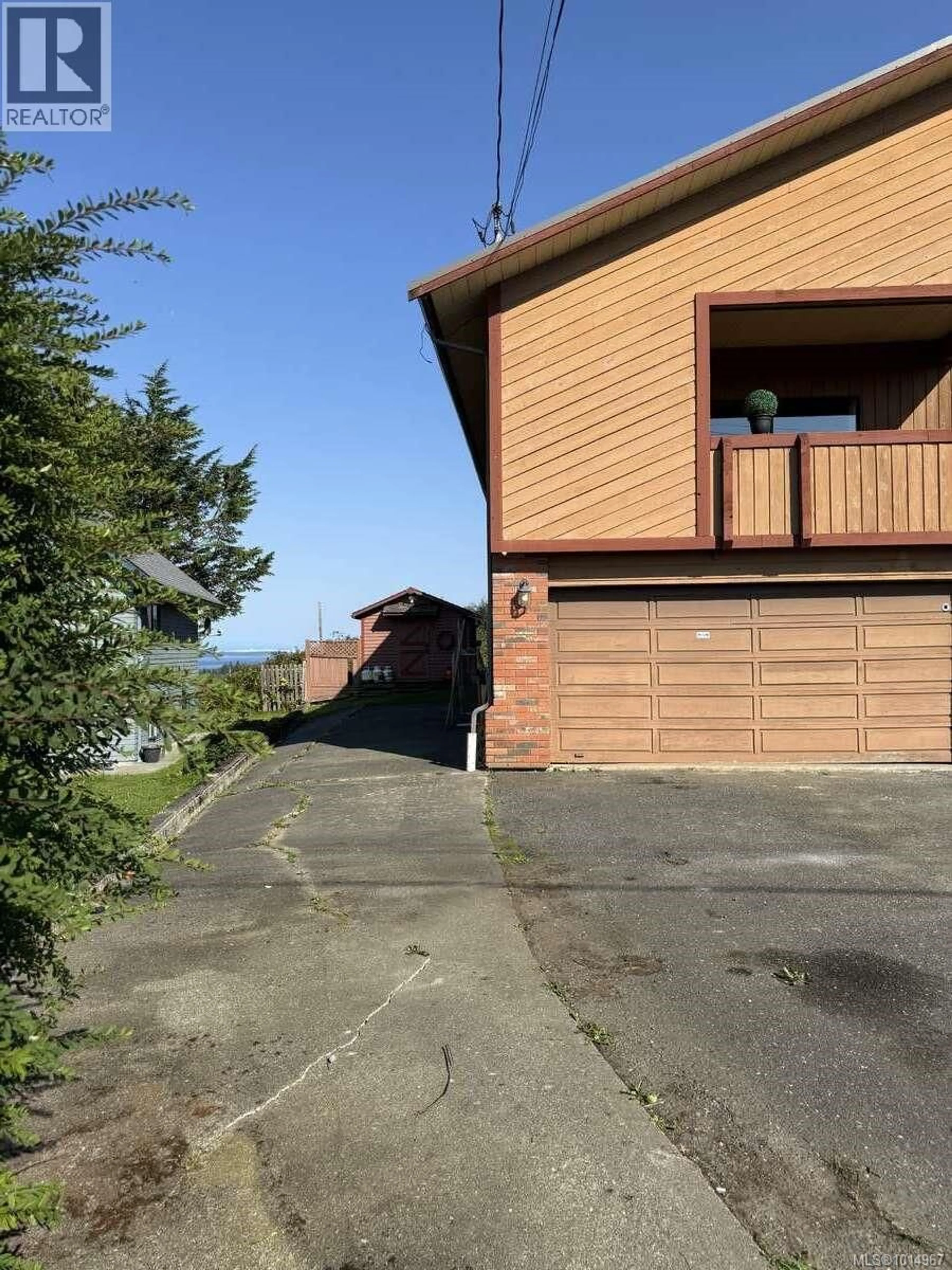 A pic from outside/outdoor area/front of a property/back of a property/a pic from drone, street for 2696 BROCKINGTON PLACE, Port McNeill British Columbia V0N2R0