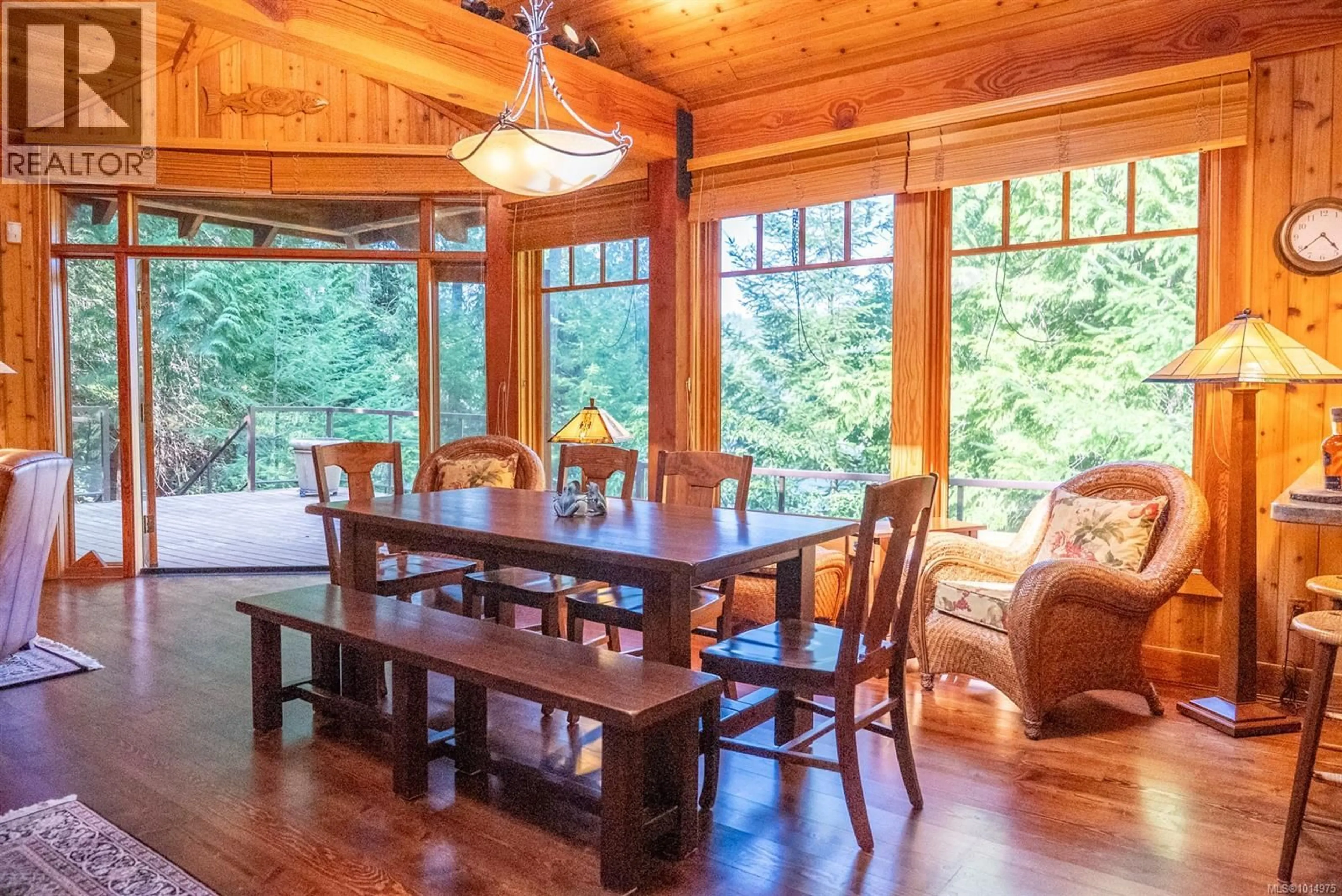 Dining room, wood/laminate floor for 8807 AINSLIE POINT ROAD, Pender Island British Columbia V0N2M3