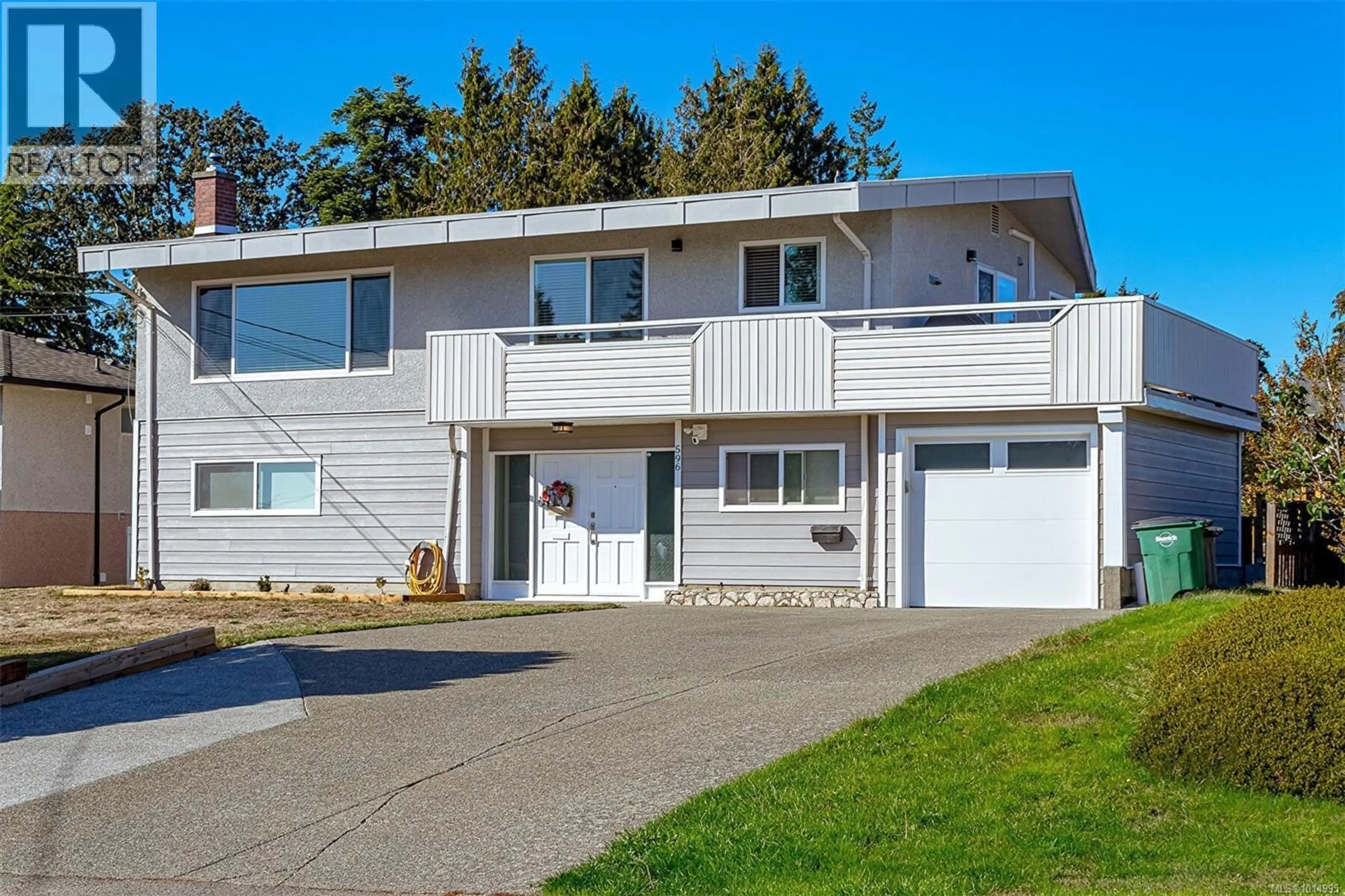 Home with vinyl exterior material, street for 596 PETO PLACE, Saanich British Columbia V8Z2K6