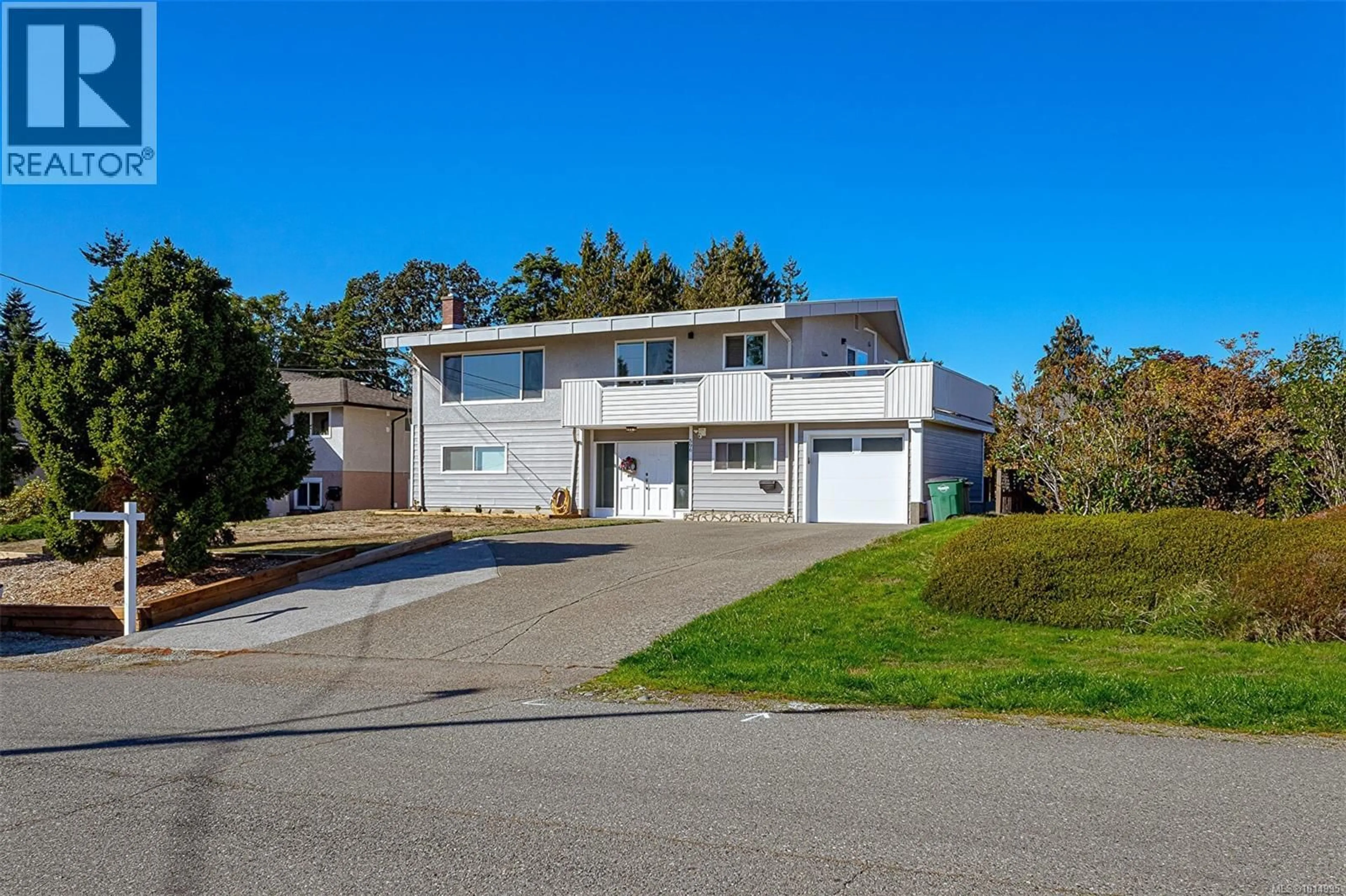 Home with vinyl exterior material, street for 596 PETO PLACE, Saanich British Columbia V8Z2K6