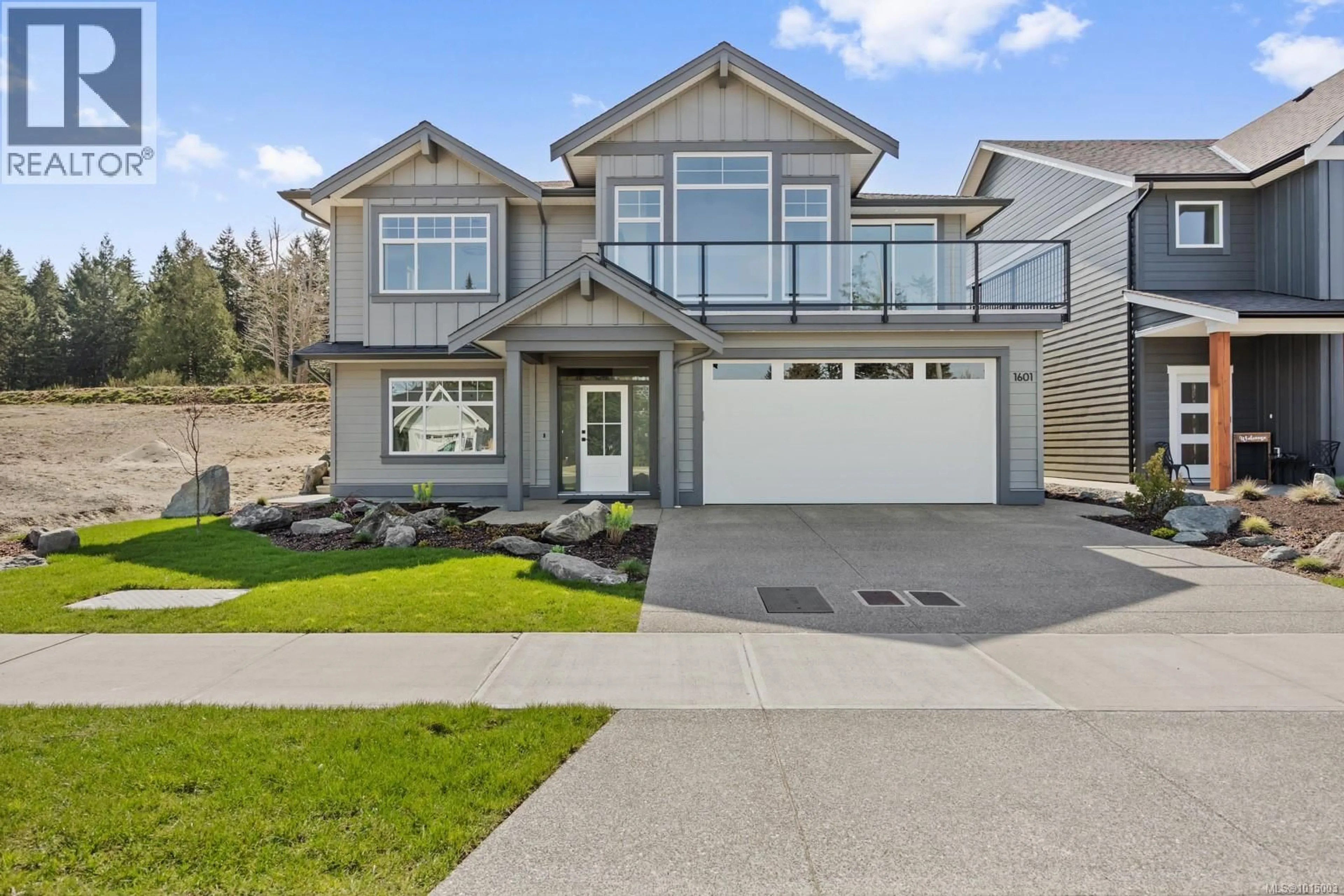 Home with vinyl exterior material, street for 1601 CROWN ISLE BOULEVARD, Courtenay British Columbia V9N9X5