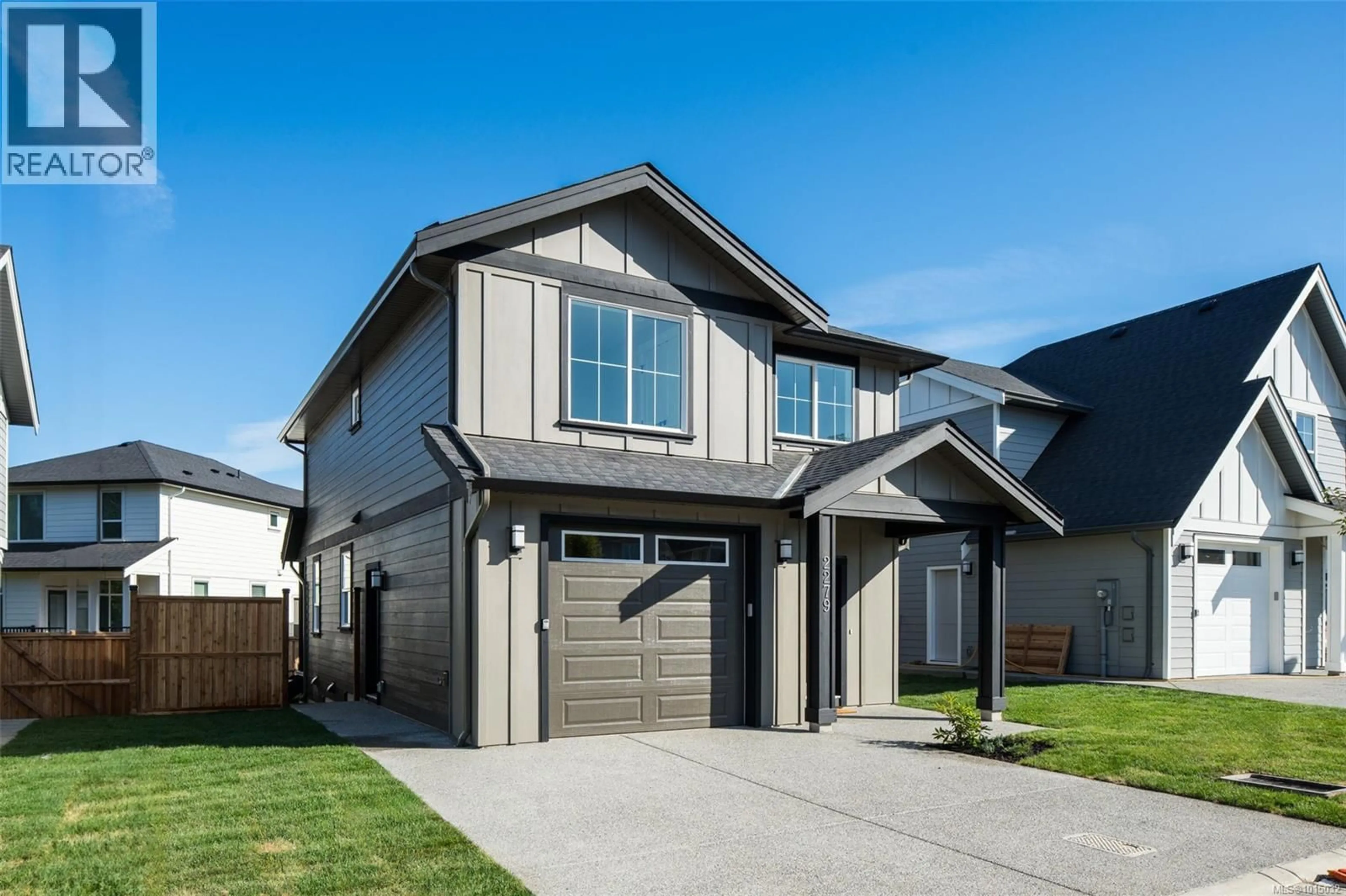Home with vinyl exterior material, street for 2271 EVELYN LANE, Sooke British Columbia V9Z0W3