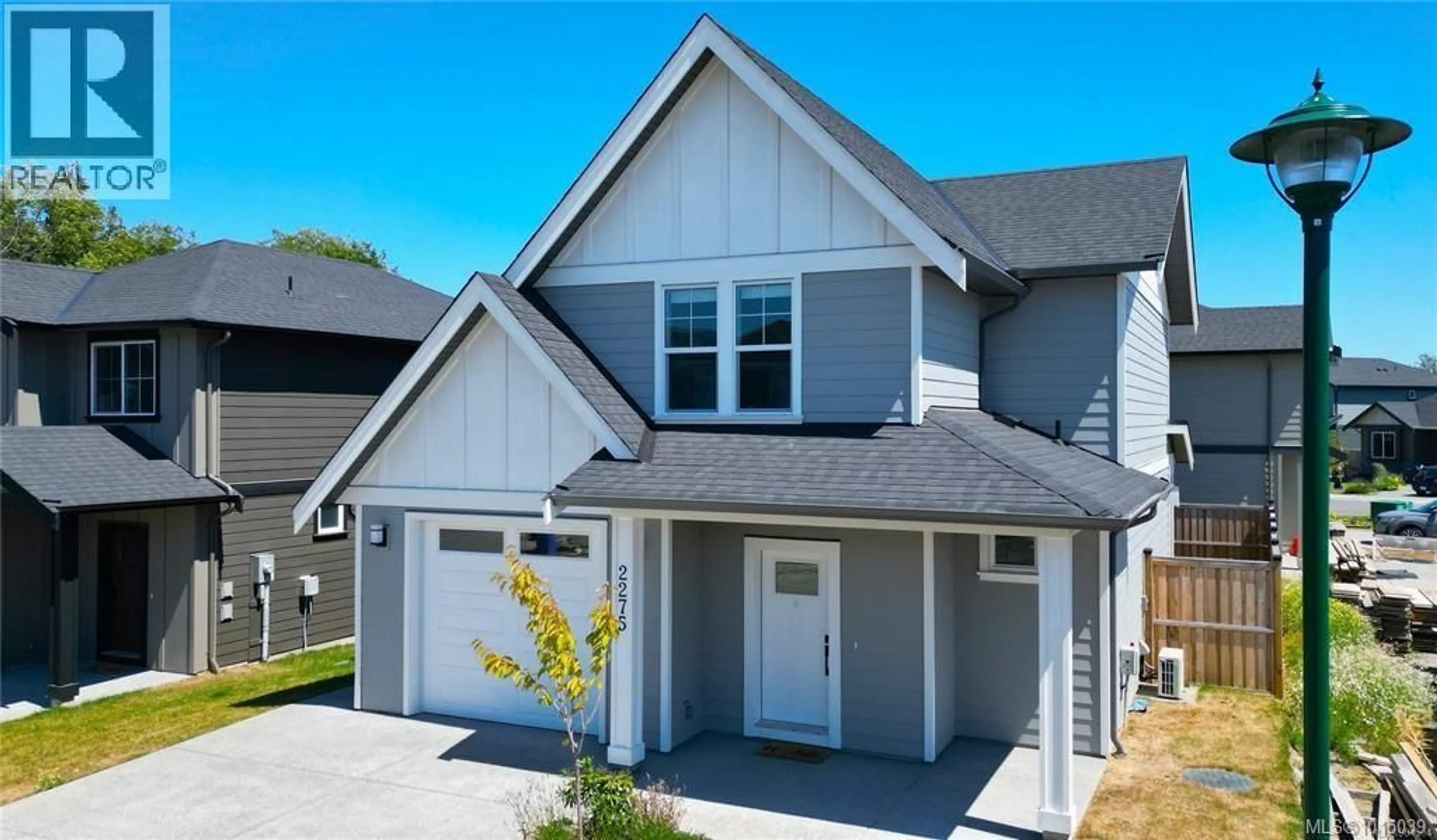 Home with vinyl exterior material, street for 2267 EVELYN LANE, Sooke British Columbia V9Z0W3