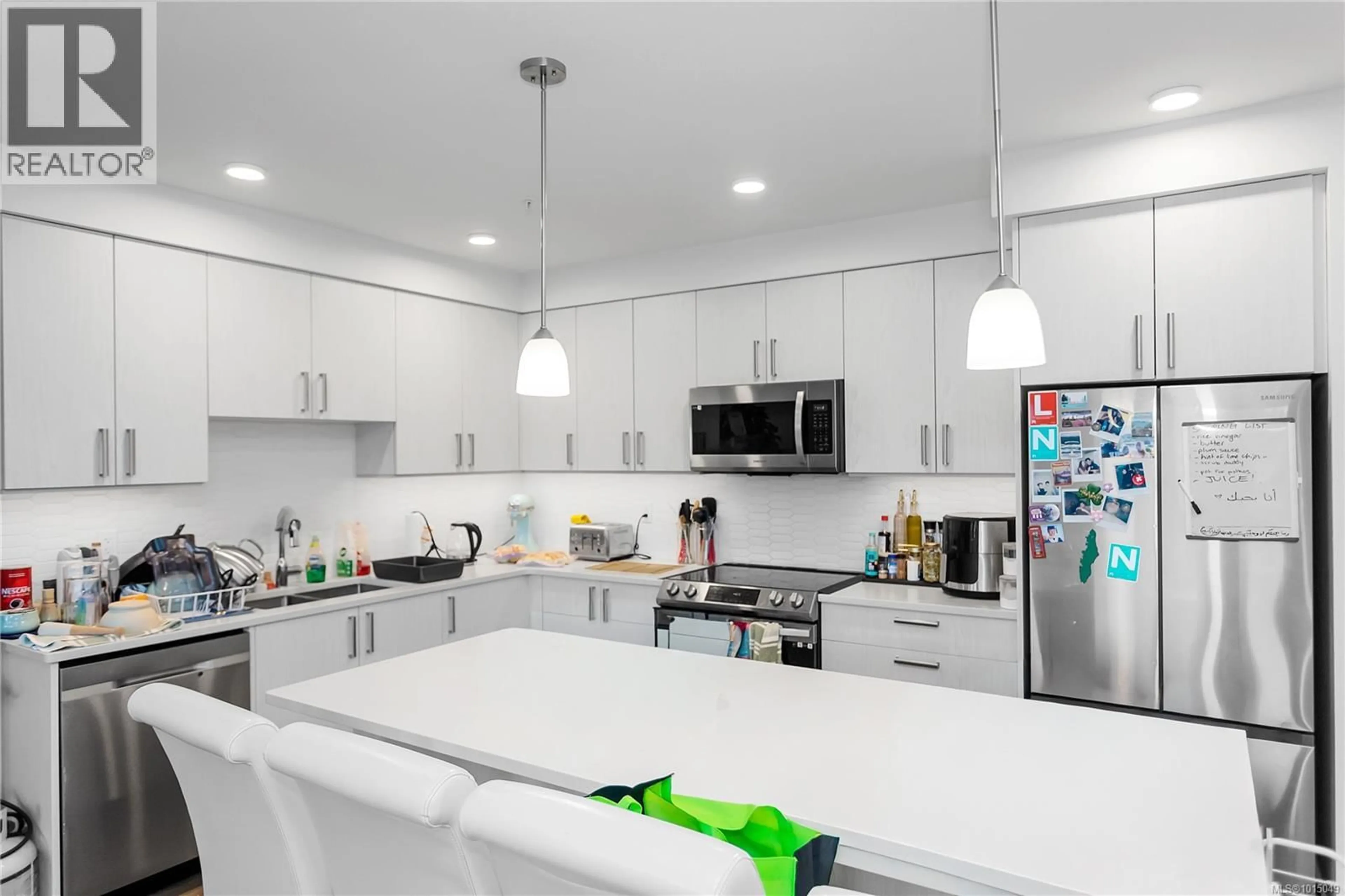 Open concept kitchen, ceramic/tile floor for 502 - 147 HALIBURTON STREET, Nanaimo British Columbia V9R4V9