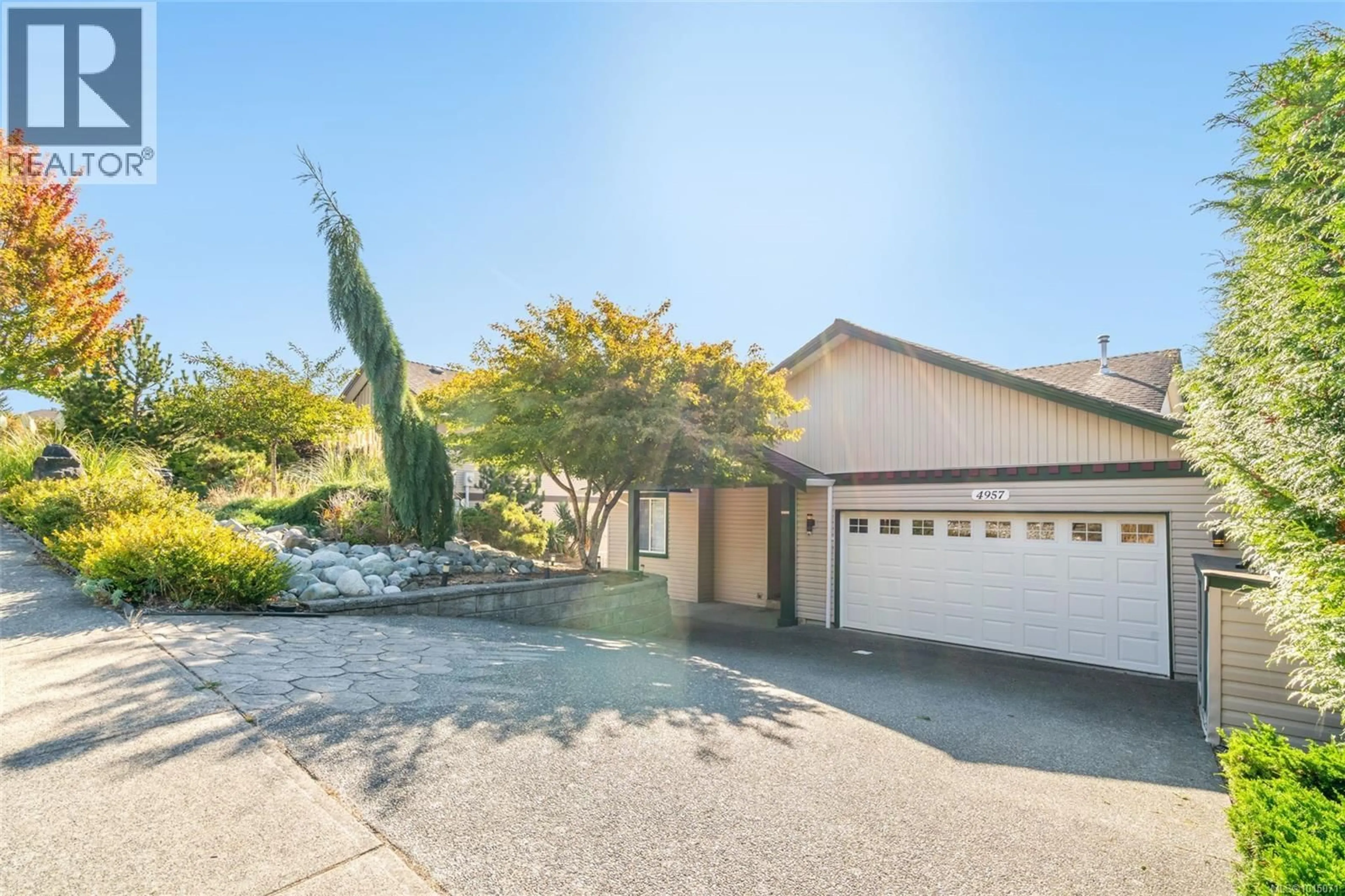 A pic from outside/outdoor area/front of a property/back of a property/a pic from drone, street for 4957 NEY DRIVE, Nanaimo British Columbia V9V1T9