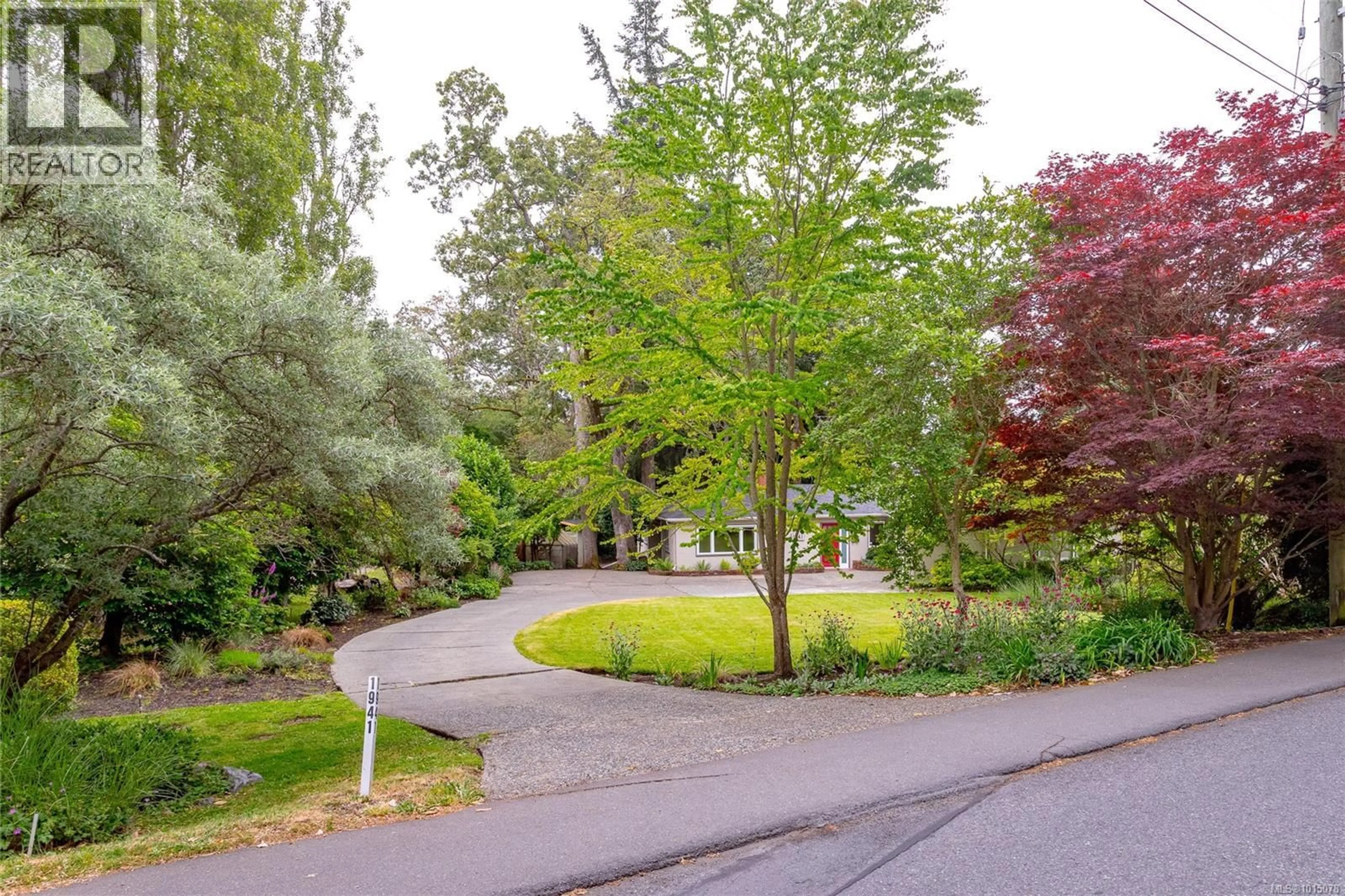 A pic from outside/outdoor area/front of a property/back of a property/a pic from drone, forest/trees view for 1941 MAYFAIR DRIVE, Saanich British Columbia V8P1R1