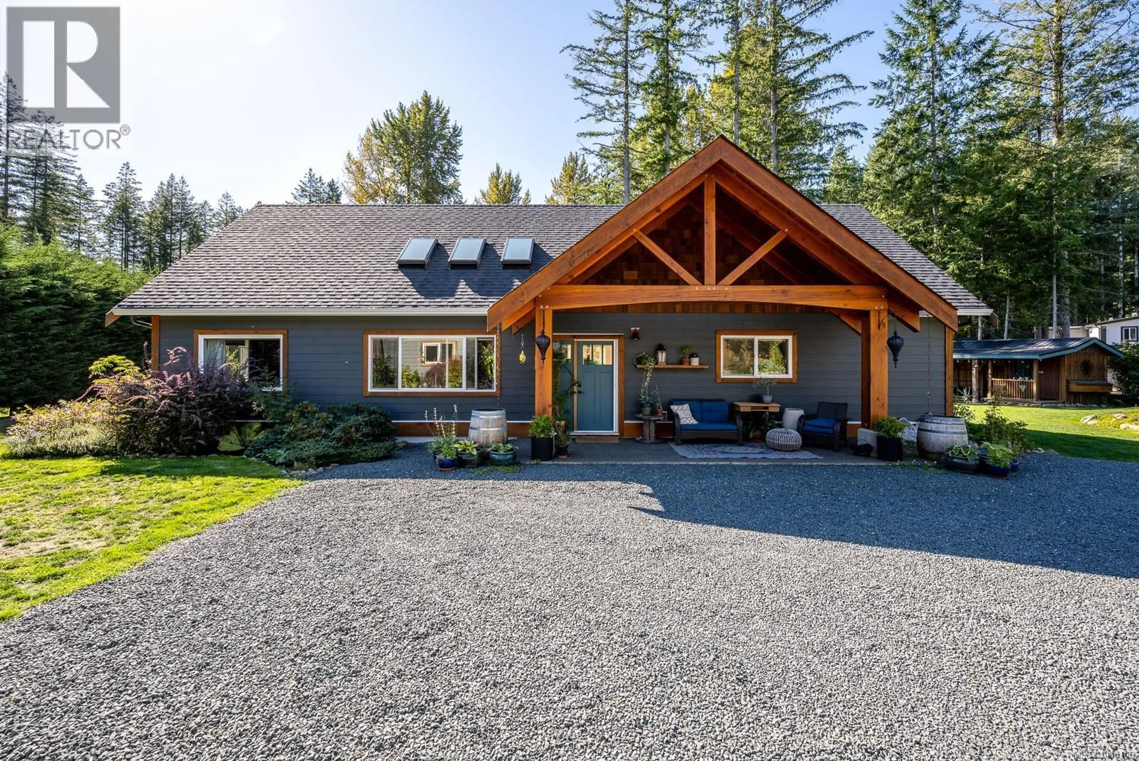 Home with vinyl exterior material, mountain view for 2675 MERVILLE ROAD, Merville British Columbia V0R2M0