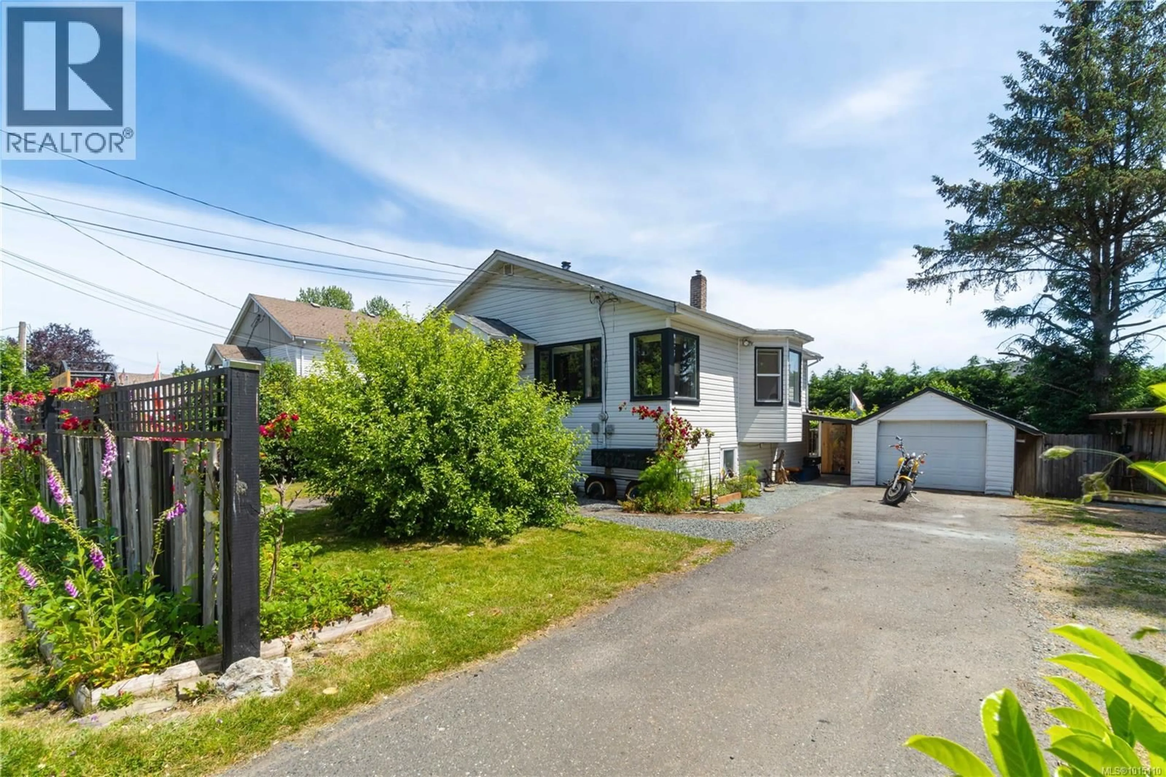 A pic from outside/outdoor area/front of a property/back of a property/a pic from drone, street for 125 HAREWOOD ROAD, Nanaimo British Columbia V9R2Y7
