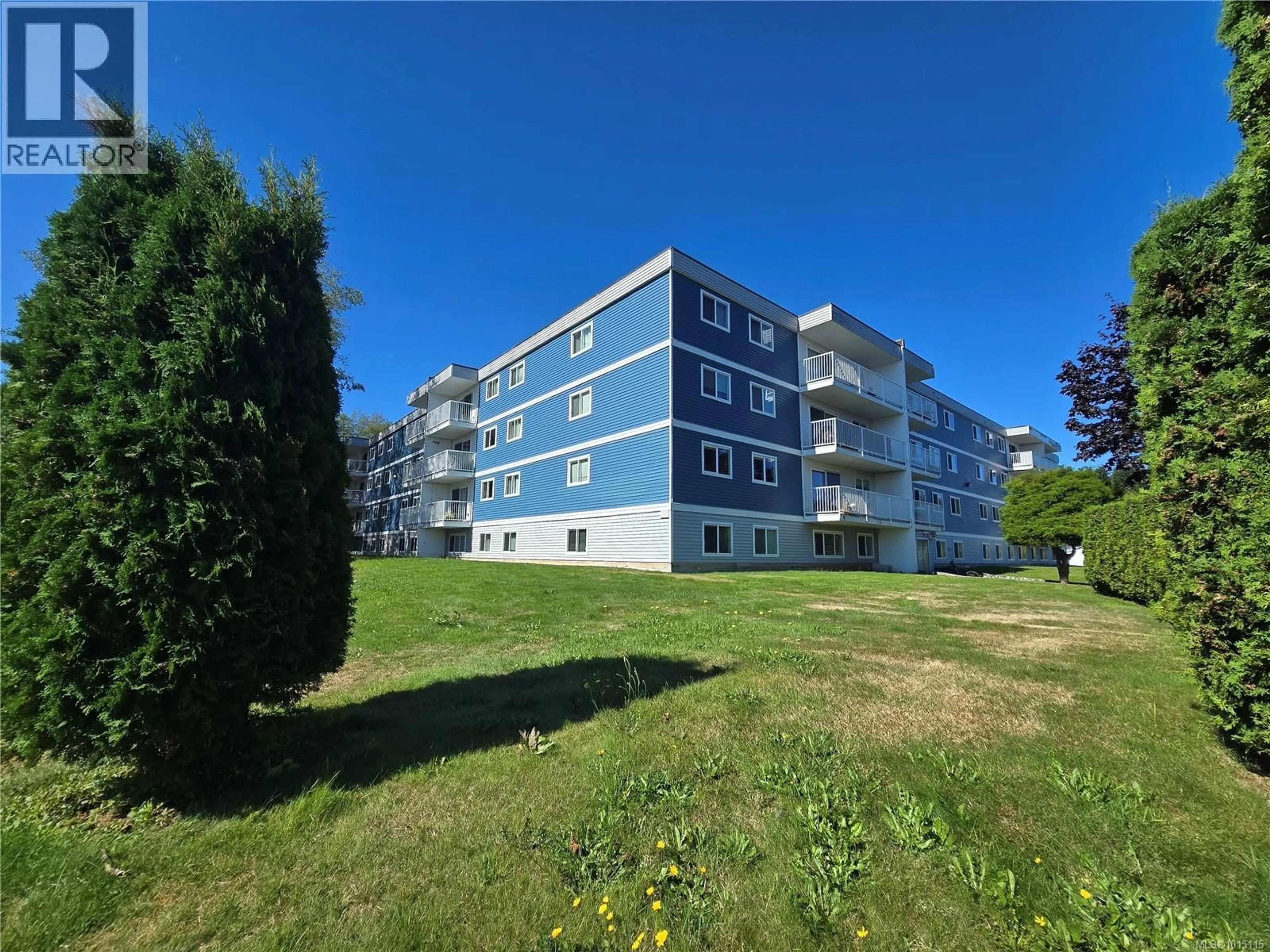 A pic from outside/outdoor area/front of a property/back of a property/a pic from drone, building for 314 - 7450 RUPERT STREET, Port Hardy British Columbia V0N2P0