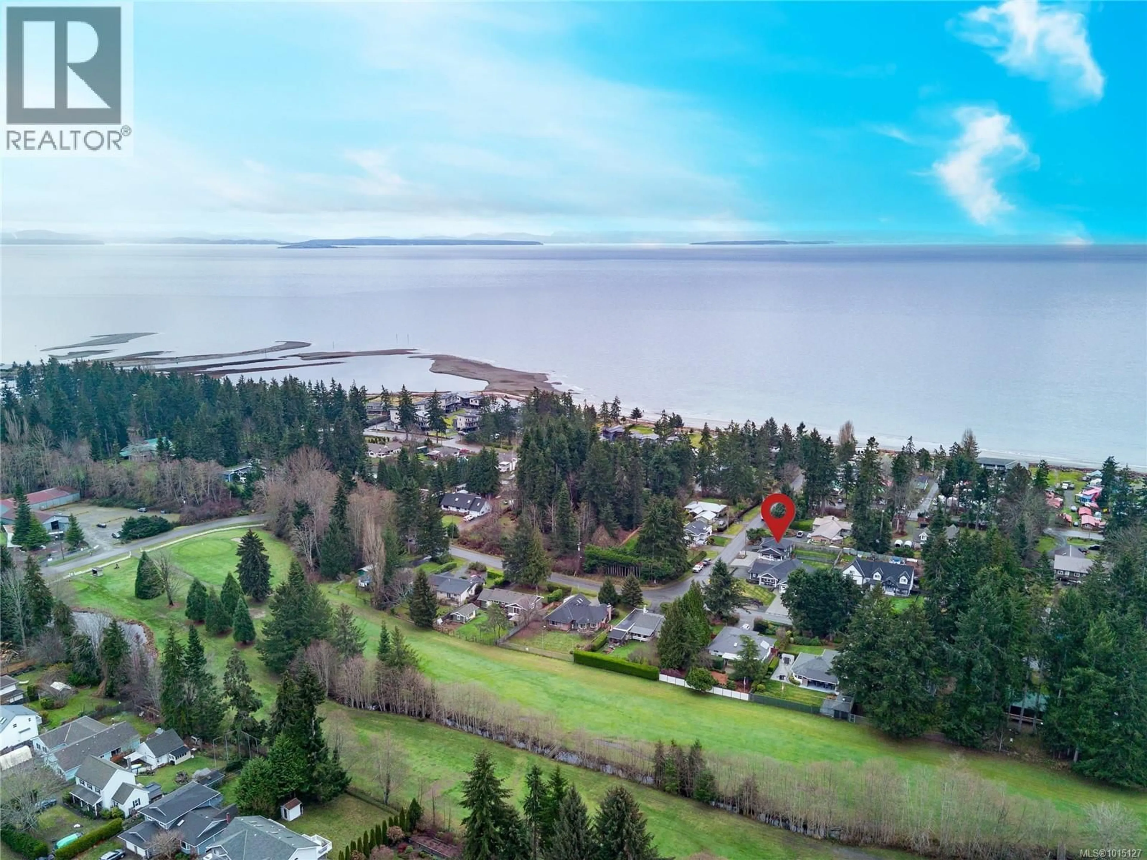 A pic from outside/outdoor area/front of a property/back of a property/a pic from drone, water/lake/river/ocean view for 8968 HENDERSON AVENUE, Black Creek British Columbia V9J1A4