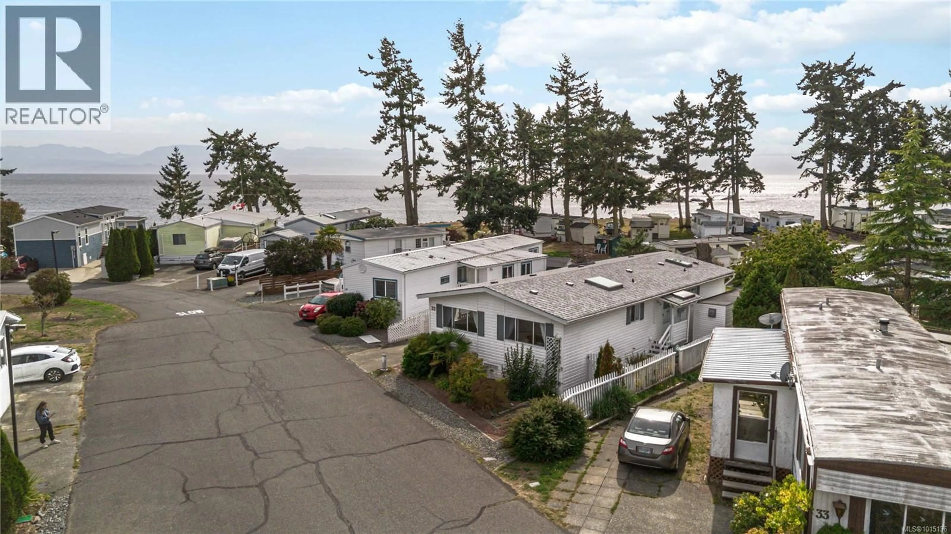 A pic from outside/outdoor area/front of a property/back of a property/a pic from drone, water/lake/river/ocean view for 32 - 7871 WEST COAST ROAD, Sooke British Columbia V9Z0R6