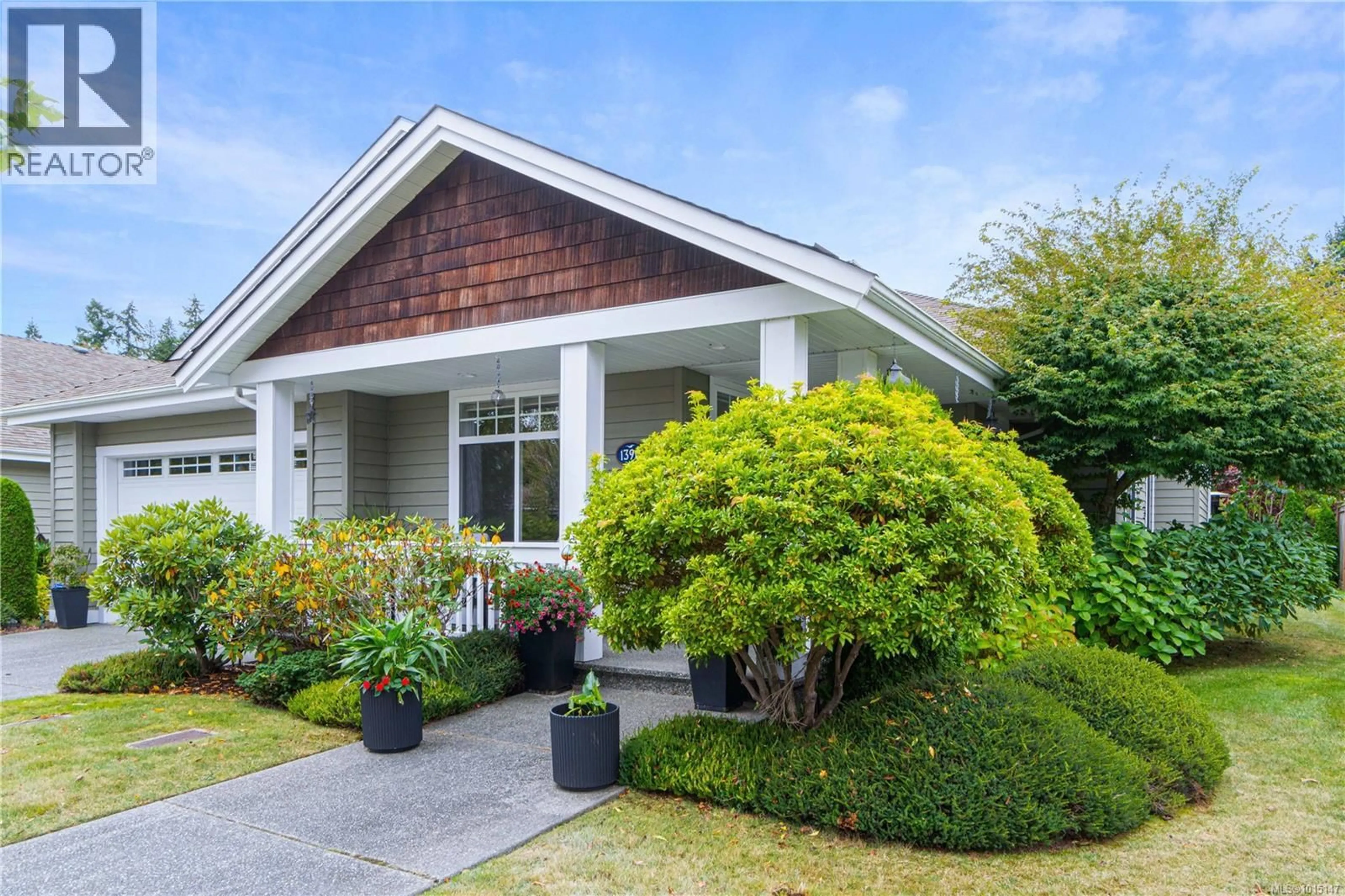 Home with vinyl exterior material, street for 1390 GABRIOLA DRIVE, Parksville British Columbia V9P2Y5