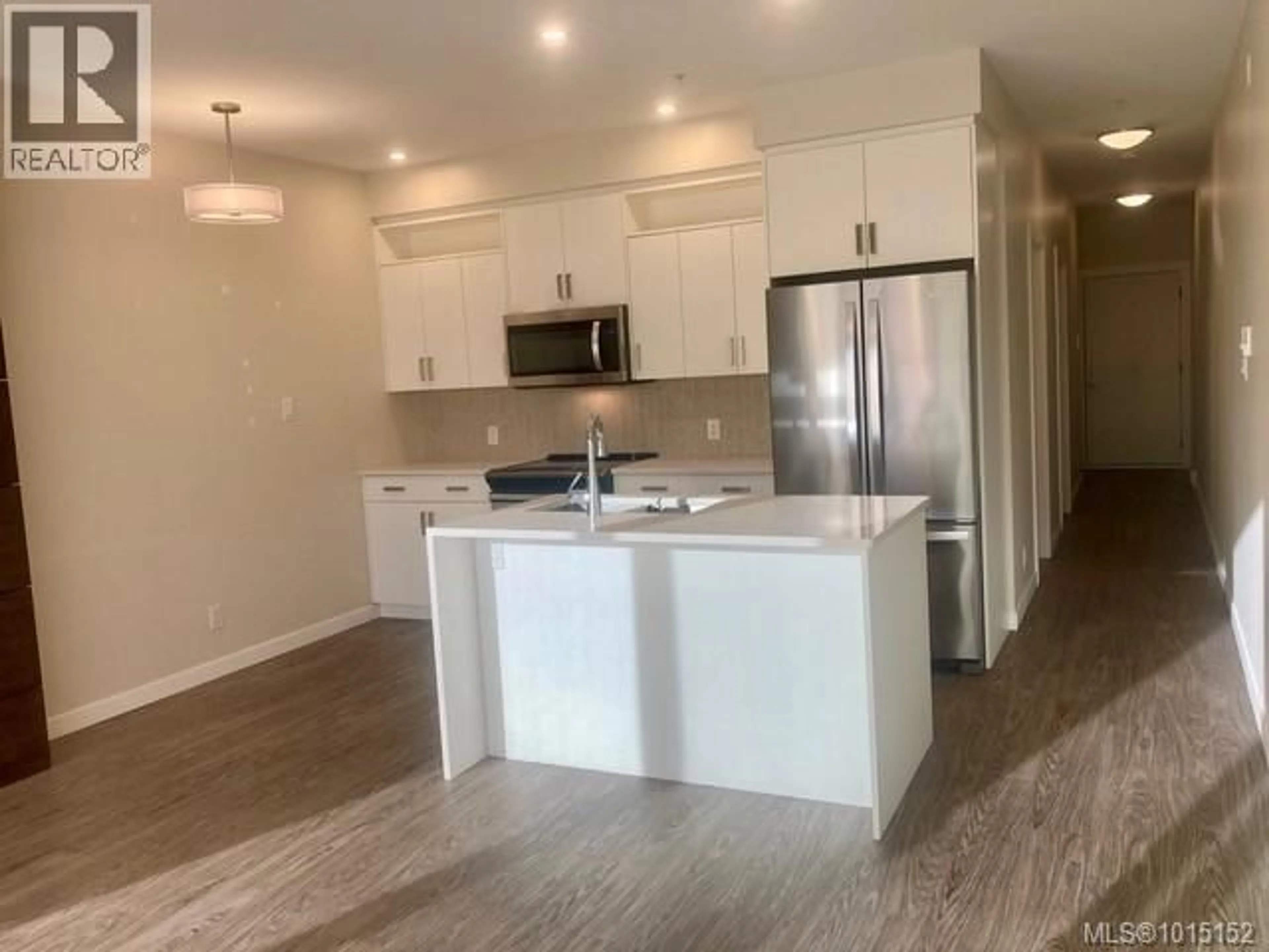 Open concept kitchen, unknown for 309 - 91 CHAPEL STREET, Nanaimo British Columbia V9R0J3