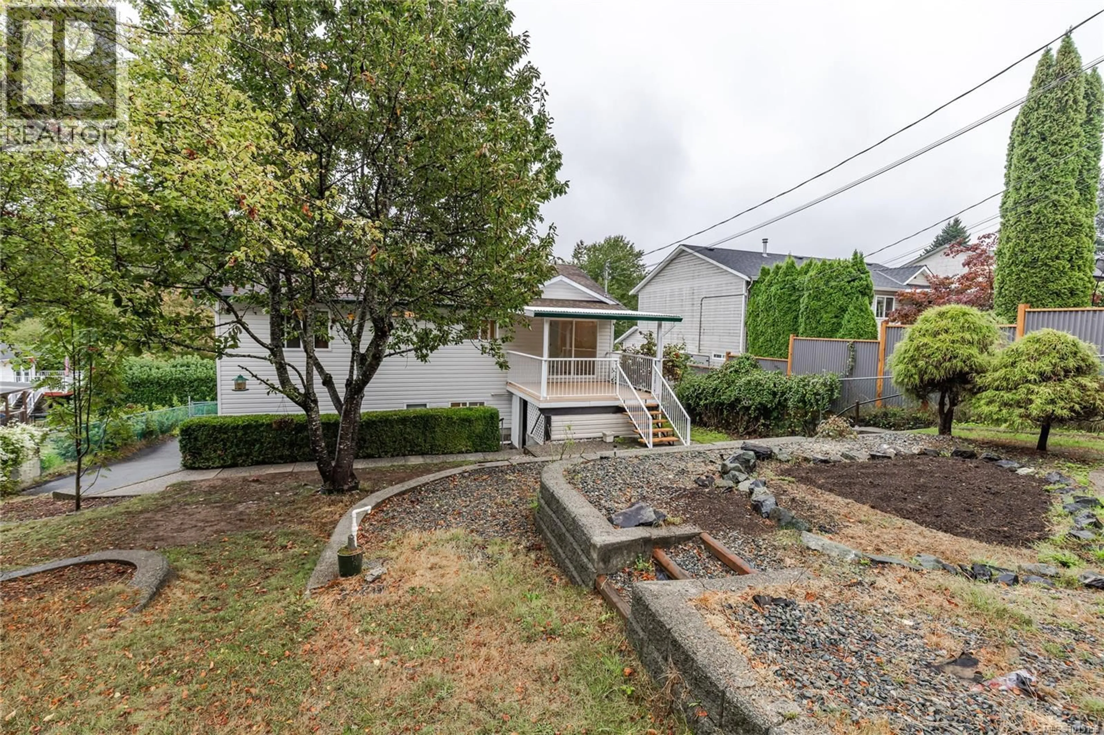 A pic from outside/outdoor area/front of a property/back of a property/a pic from drone, street for 1003 BRAMBLEWOOD LANE, Nanaimo British Columbia V9R6N9