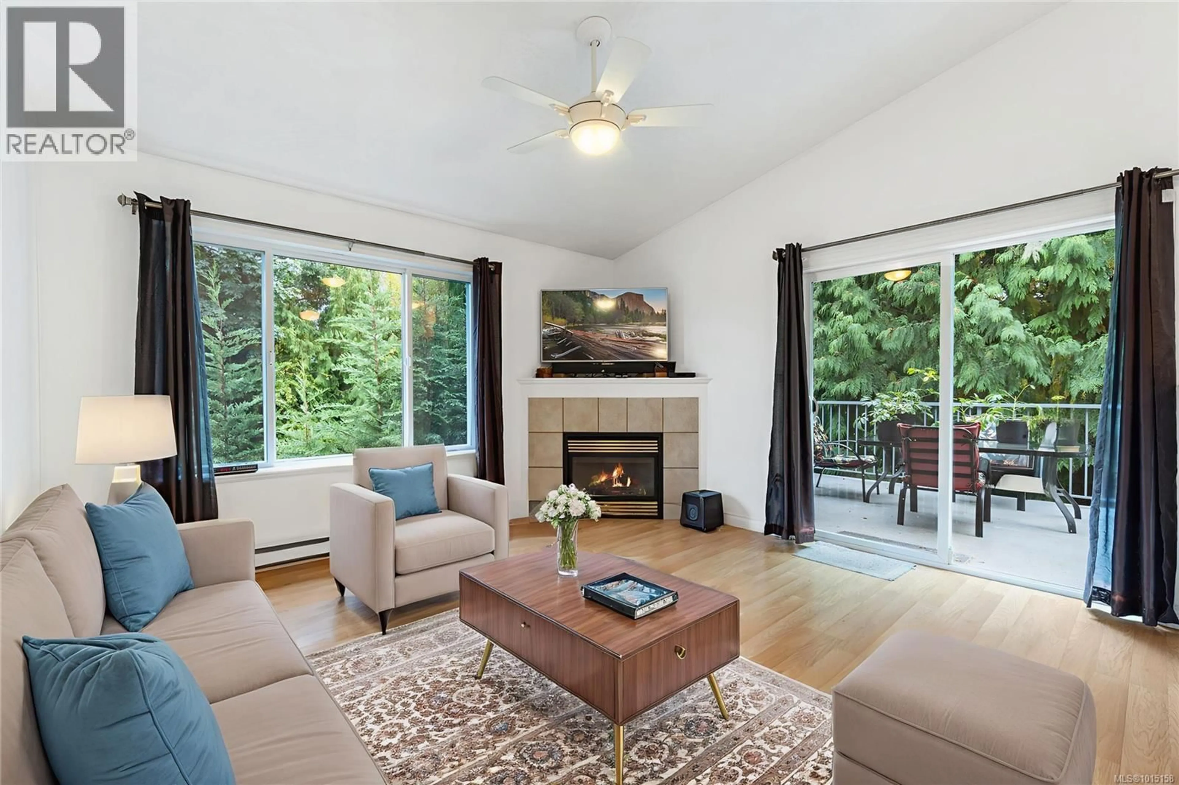Living room with furniture, wood/laminate floor for 1684 LAILAH'S LOOP, Qualicum Beach British Columbia V9K2S3