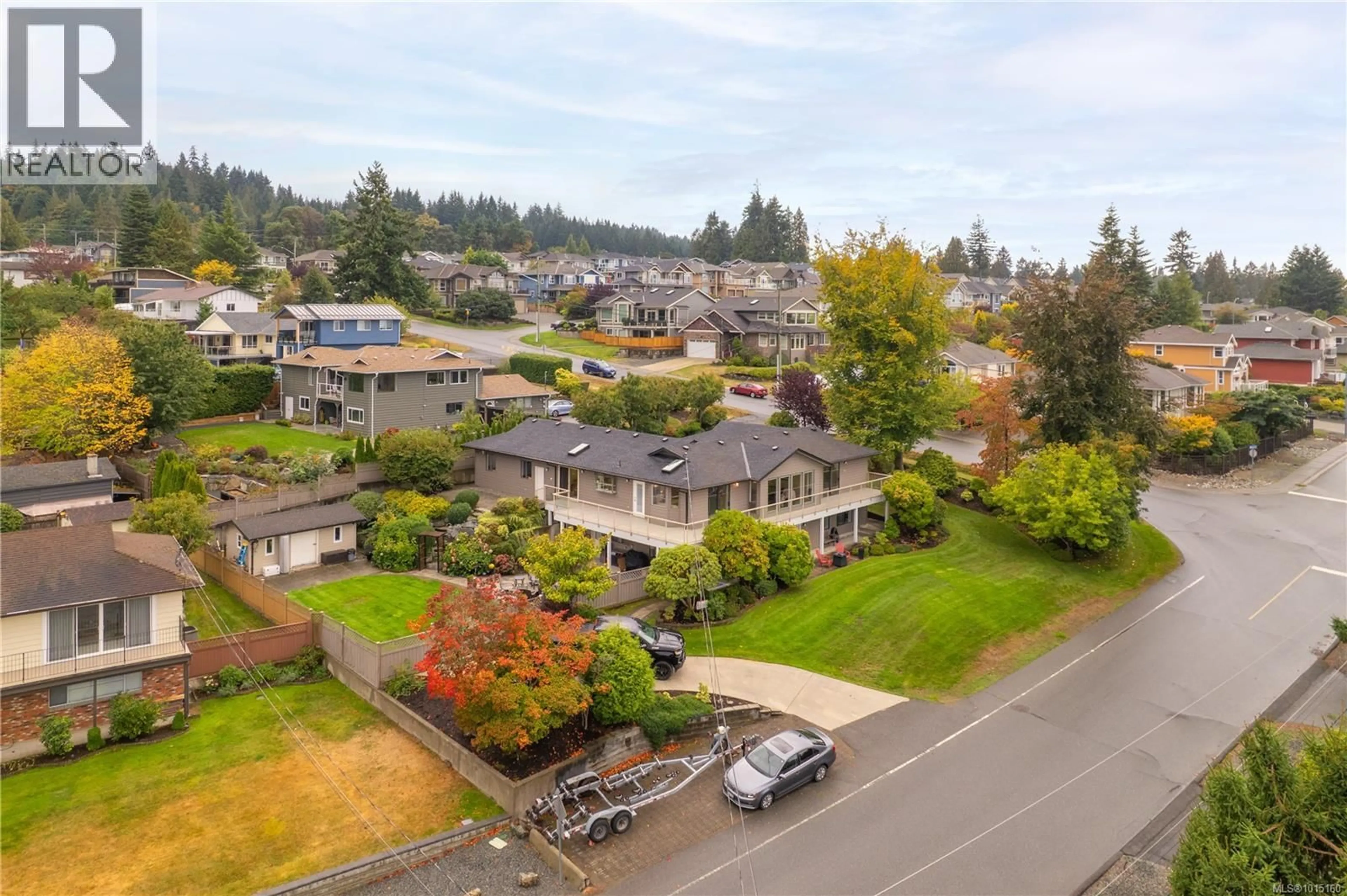 A pic from outside/outdoor area/front of a property/back of a property/a pic from drone, unknown for 5750 NORASEA ROAD, Nanaimo British Columbia V9V1G6
