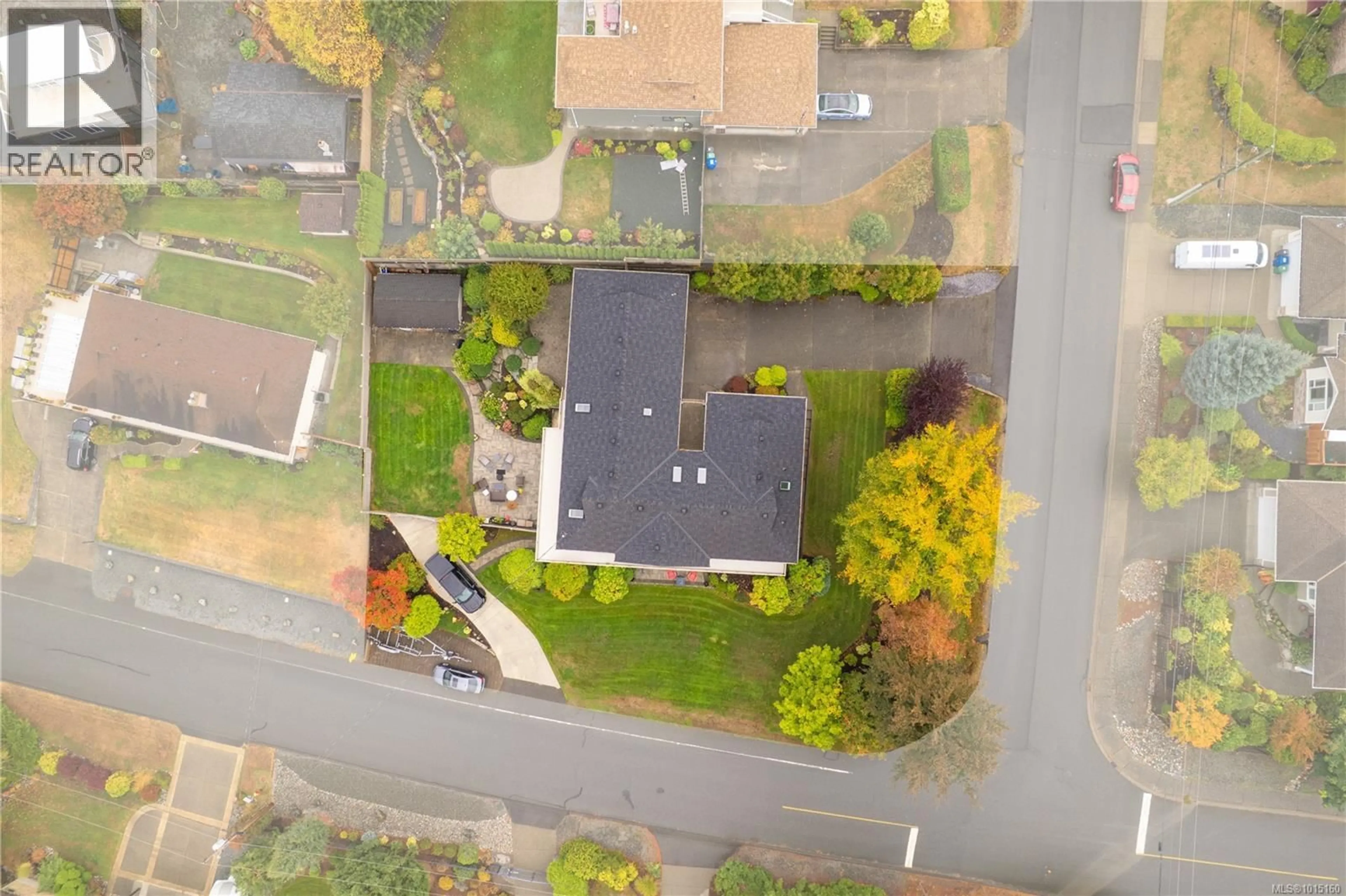 A pic from outside/outdoor area/front of a property/back of a property/a pic from drone, street for 5750 NORASEA ROAD, Nanaimo British Columbia V9V1G6