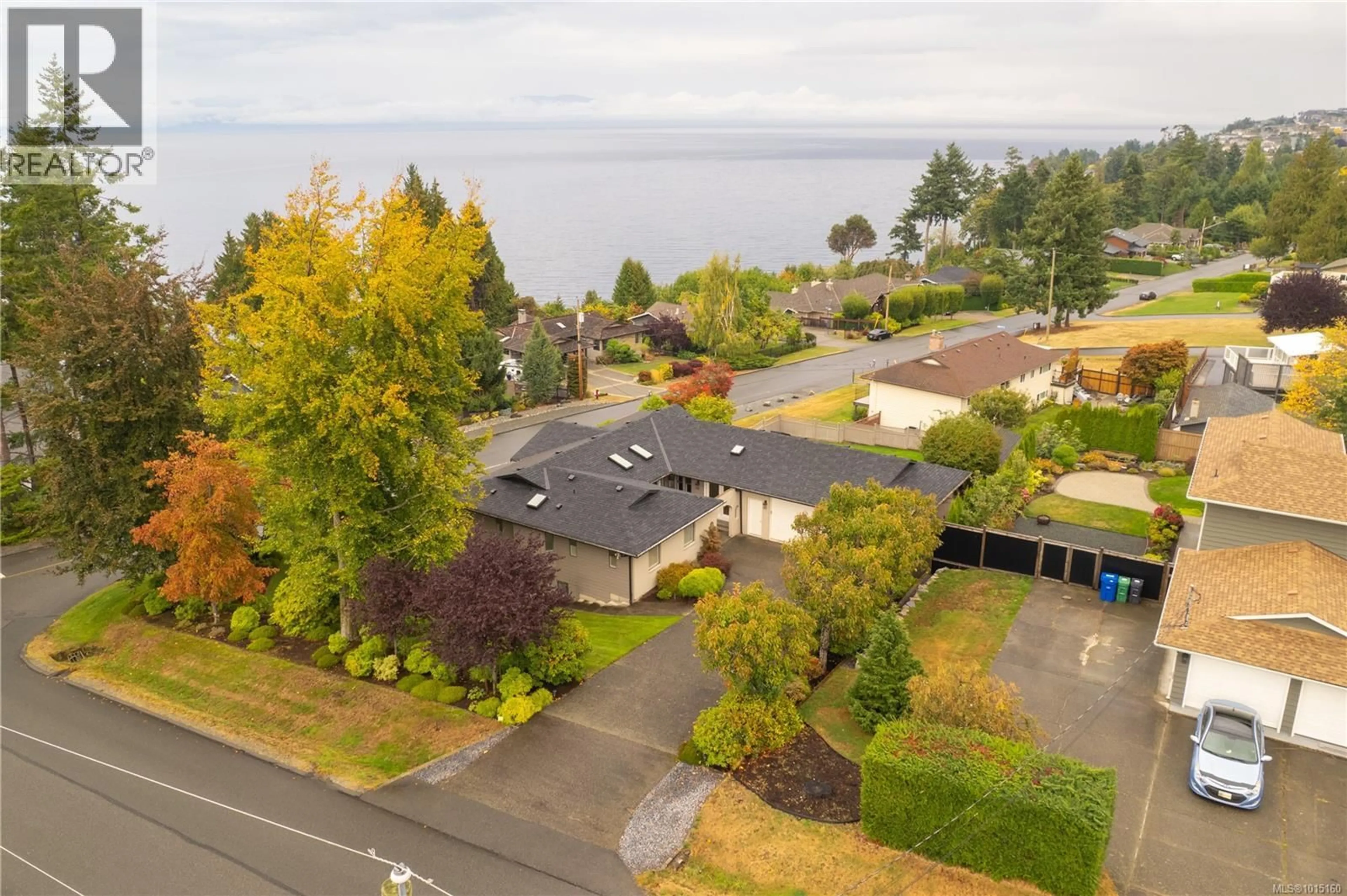 A pic from outside/outdoor area/front of a property/back of a property/a pic from drone, water/lake/river/ocean view for 5750 NORASEA ROAD, Nanaimo British Columbia V9V1G6