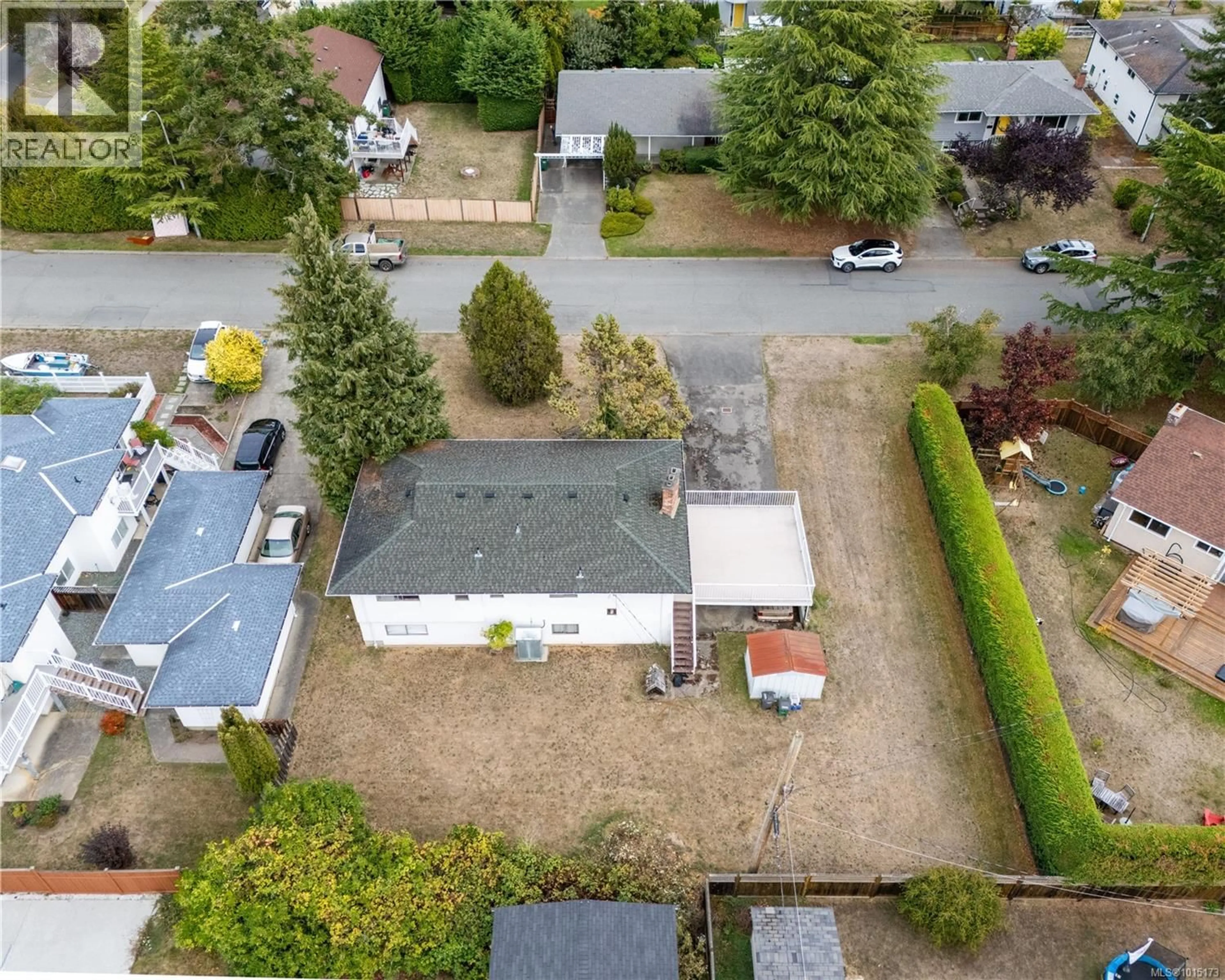 A pic from outside/outdoor area/front of a property/back of a property/a pic from drone, street for 1805 FAIRBURN DRIVE, Saanich British Columbia V8N1P7