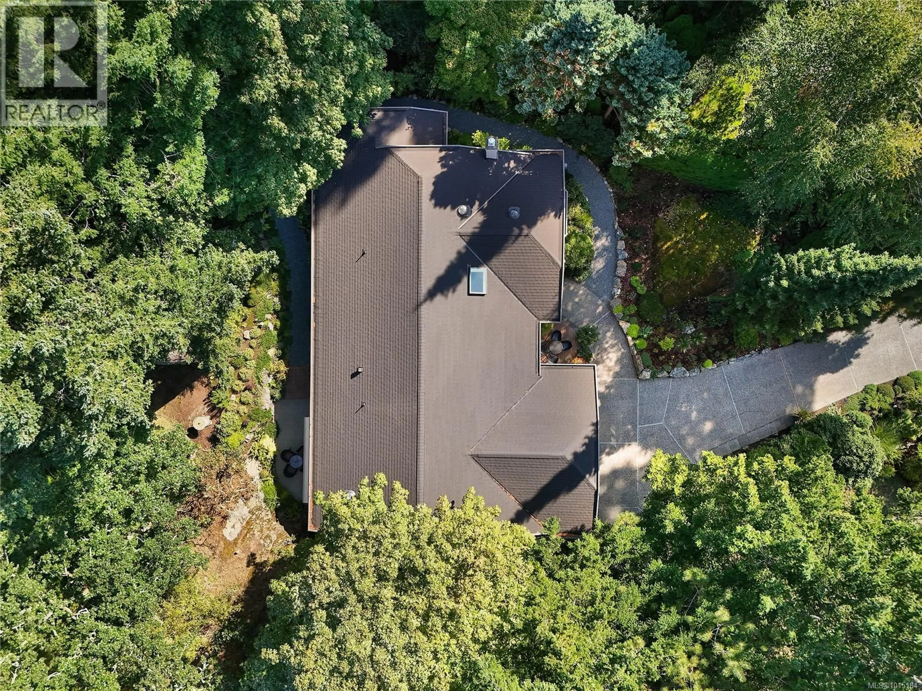 A pic from outside/outdoor area/front of a property/back of a property/a pic from drone, forest/trees view for 4467 AUTUMNWOOD LANE, Saanich British Columbia V8X4V8