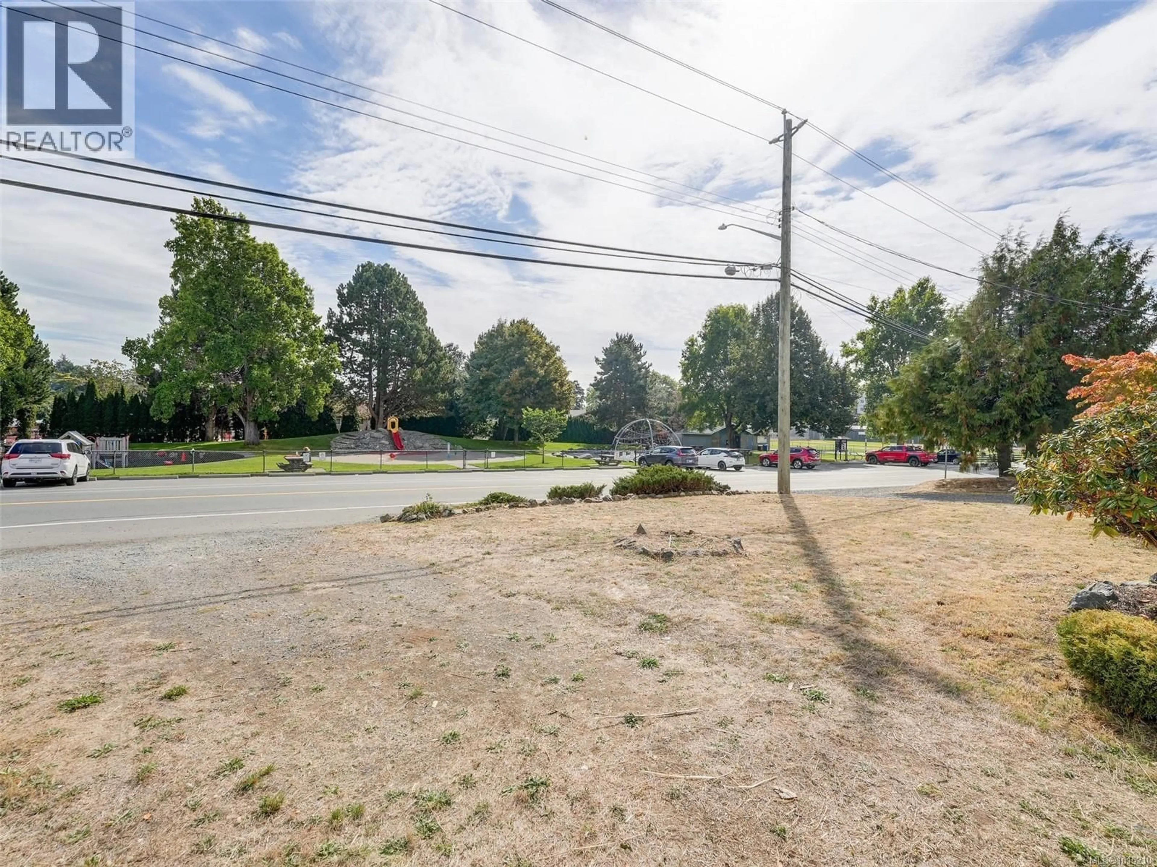 A pic from outside/outdoor area/front of a property/back of a property/a pic from drone, street for 2814 CARLOW ROAD, Langford British Columbia V9B4E3