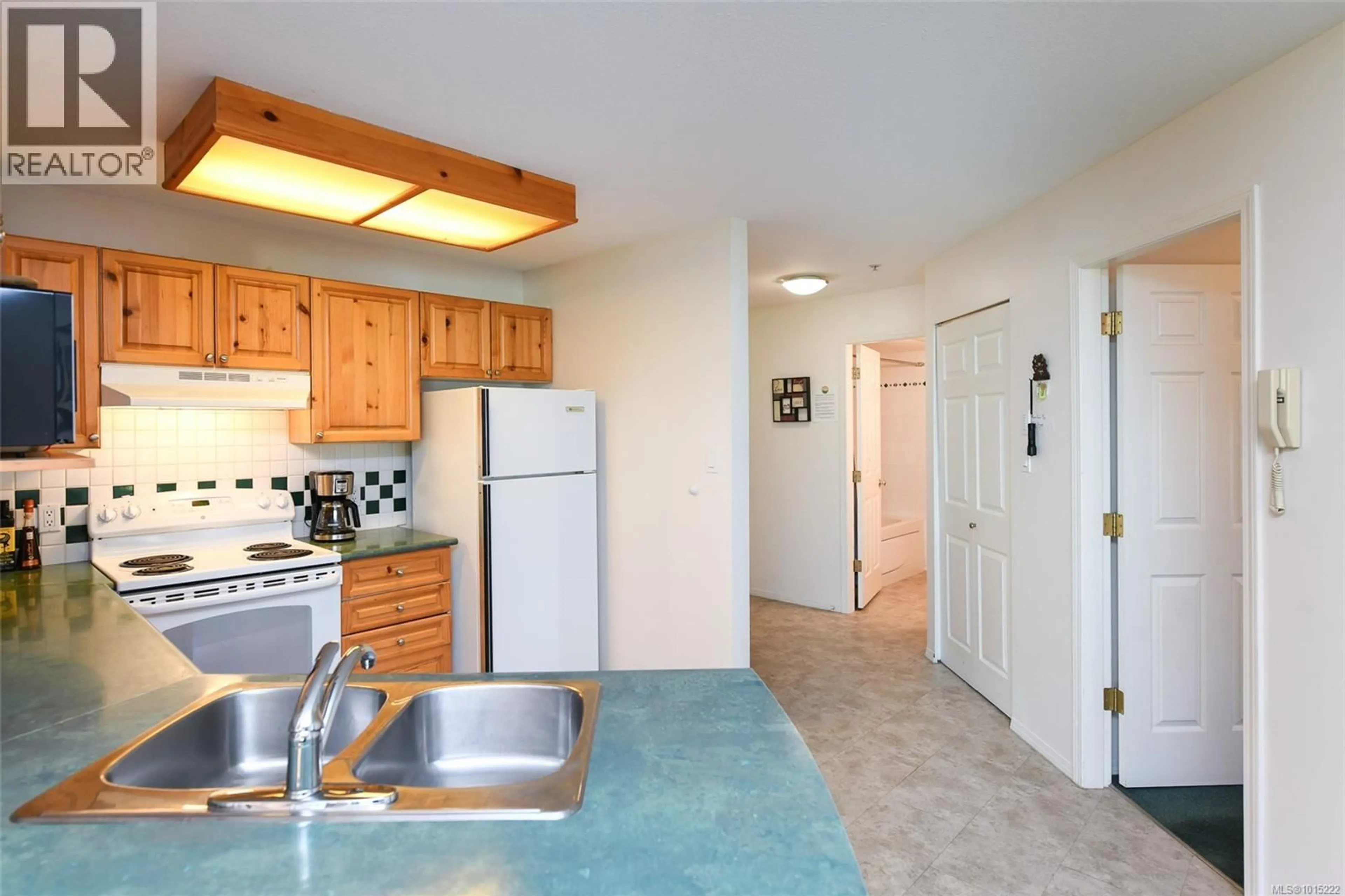 Standard kitchen, ceramic/tile floor for 217 - 1320 HENRY ROAD, Courtenay British Columbia V9J1L0