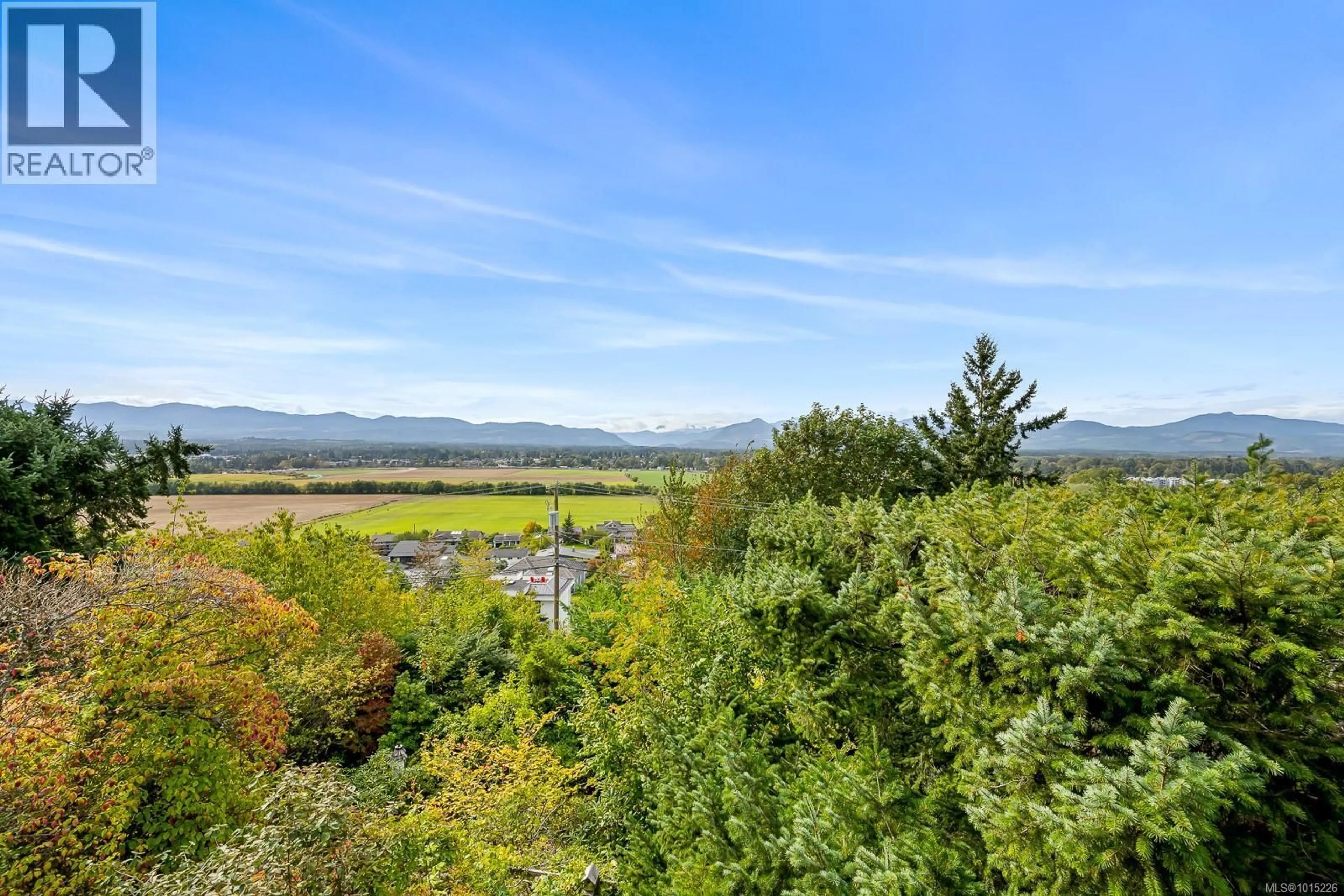 A pic from outside/outdoor area/front of a property/back of a property/a pic from drone, mountain view for 1345 GLEN URQUHART DRIVE, Courtenay British Columbia V9N3Y3
