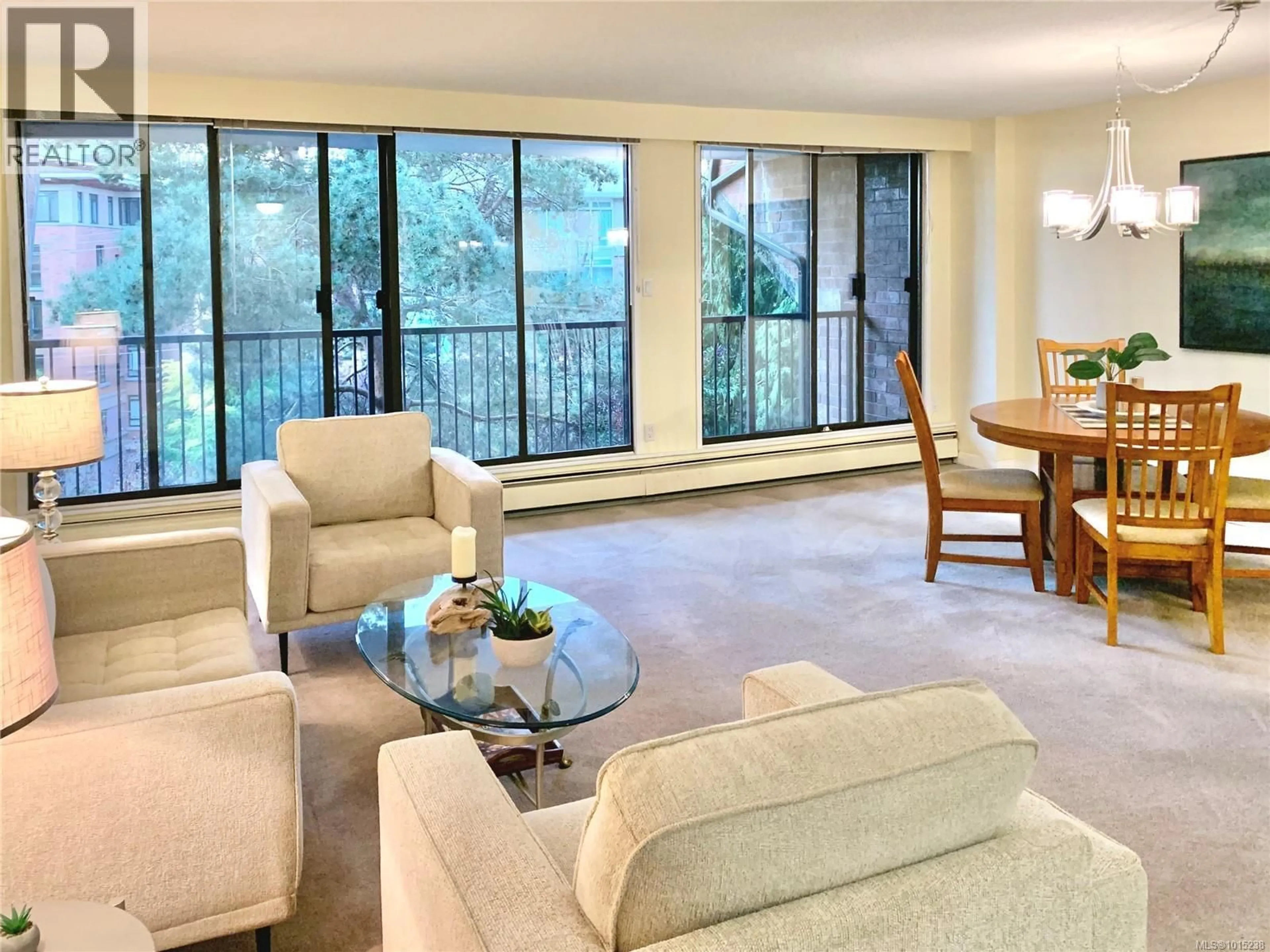 Living room with furniture, unknown for 305 - 777 BLANSHARD STREET, Victoria British Columbia V8W2G9