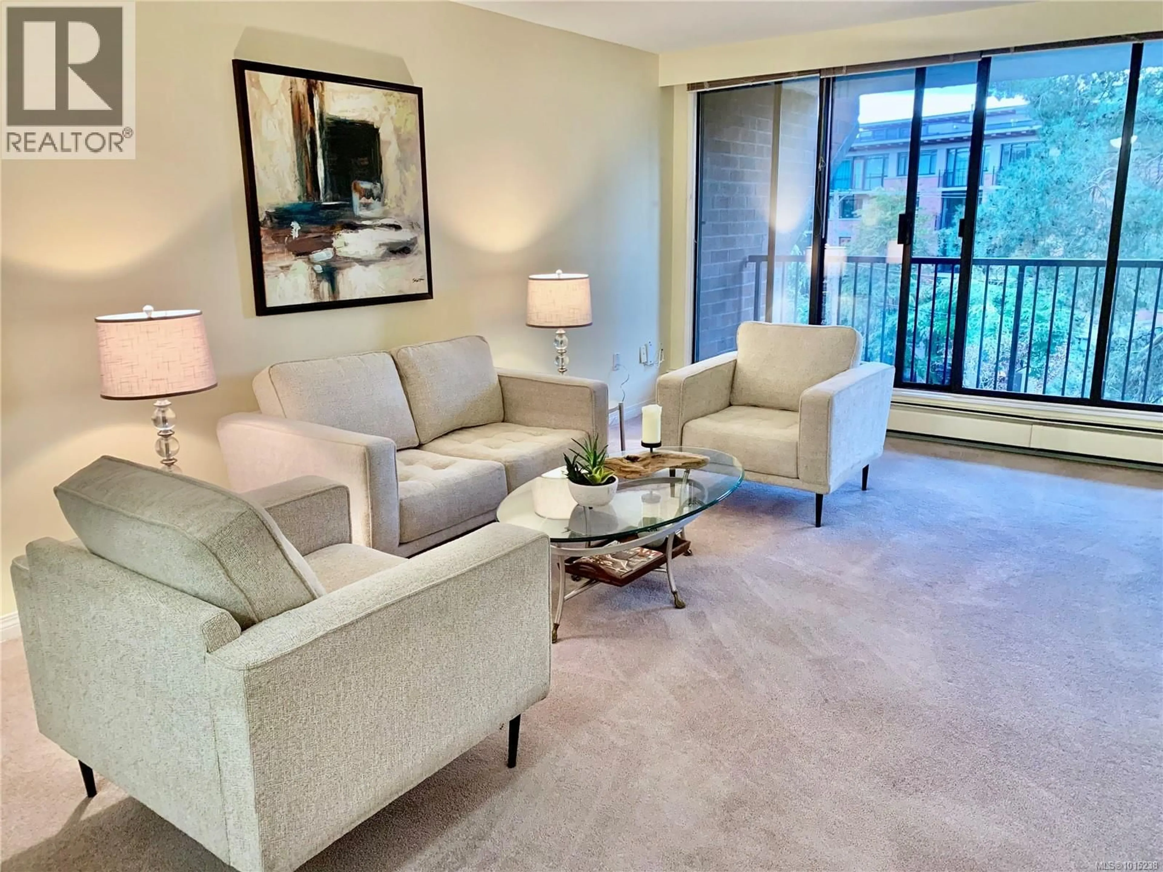 Living room with furniture, unknown for 305 - 777 BLANSHARD STREET, Victoria British Columbia V8W2G9