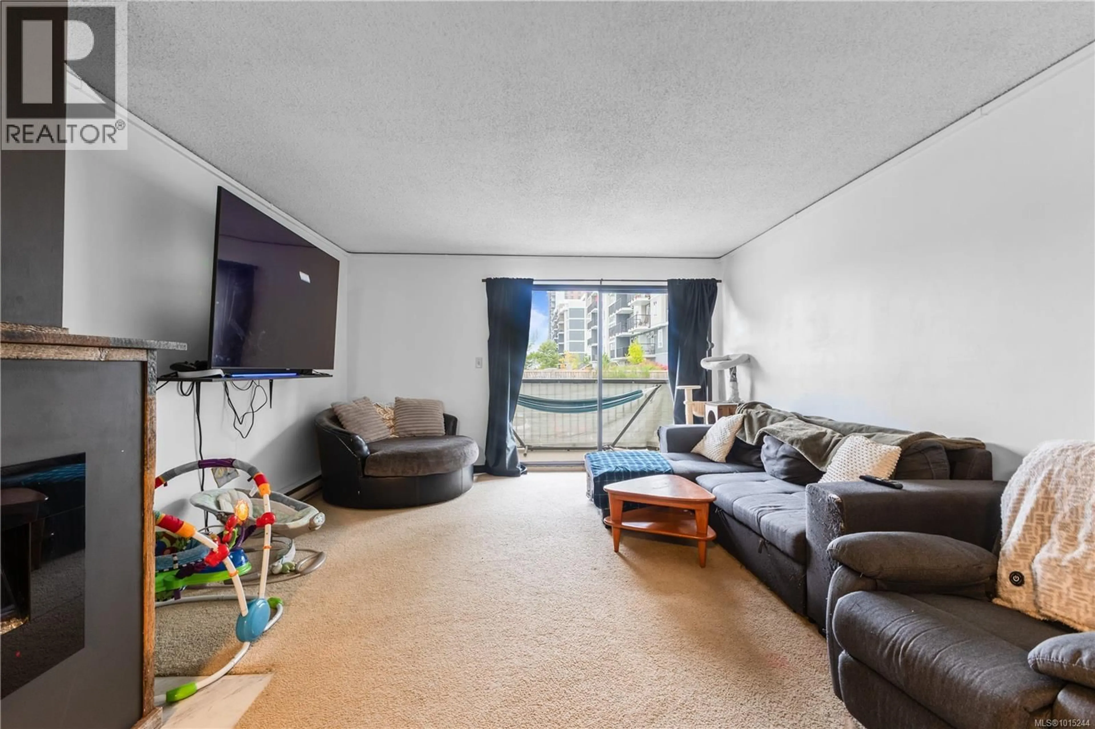 Living room with furniture, unknown for 208 - 585 DOGWOOD STREET, Campbell River British Columbia V9W6T6