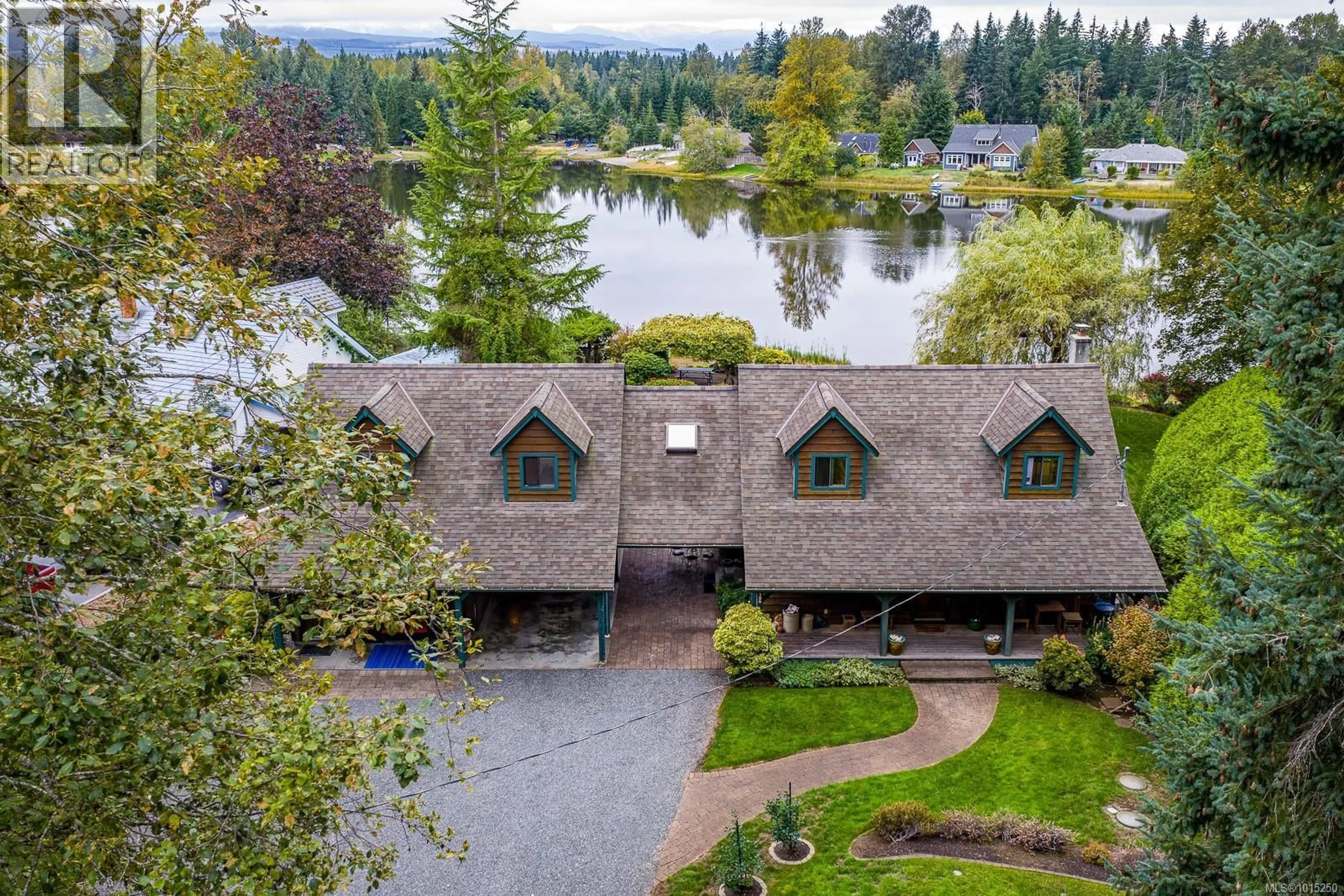 A pic from outside/outdoor area/front of a property/back of a property/a pic from drone, water/lake/river/ocean view for 9386 MARTIN PARK DRIVE, Black Creek British Columbia V9J1C4