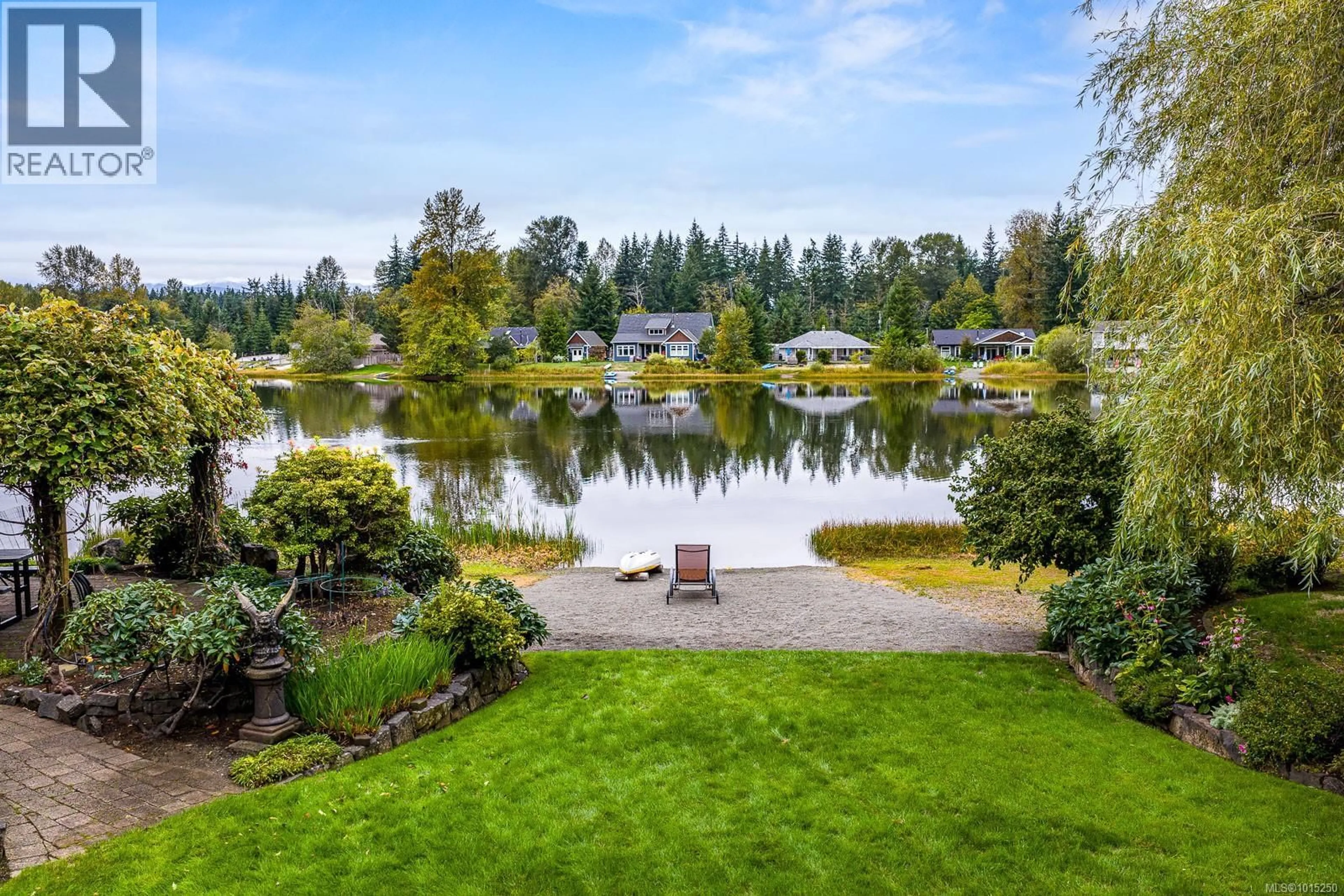 A pic from outside/outdoor area/front of a property/back of a property/a pic from drone, water/lake/river/ocean view for 9386 MARTIN PARK DRIVE, Black Creek British Columbia V9J1C4