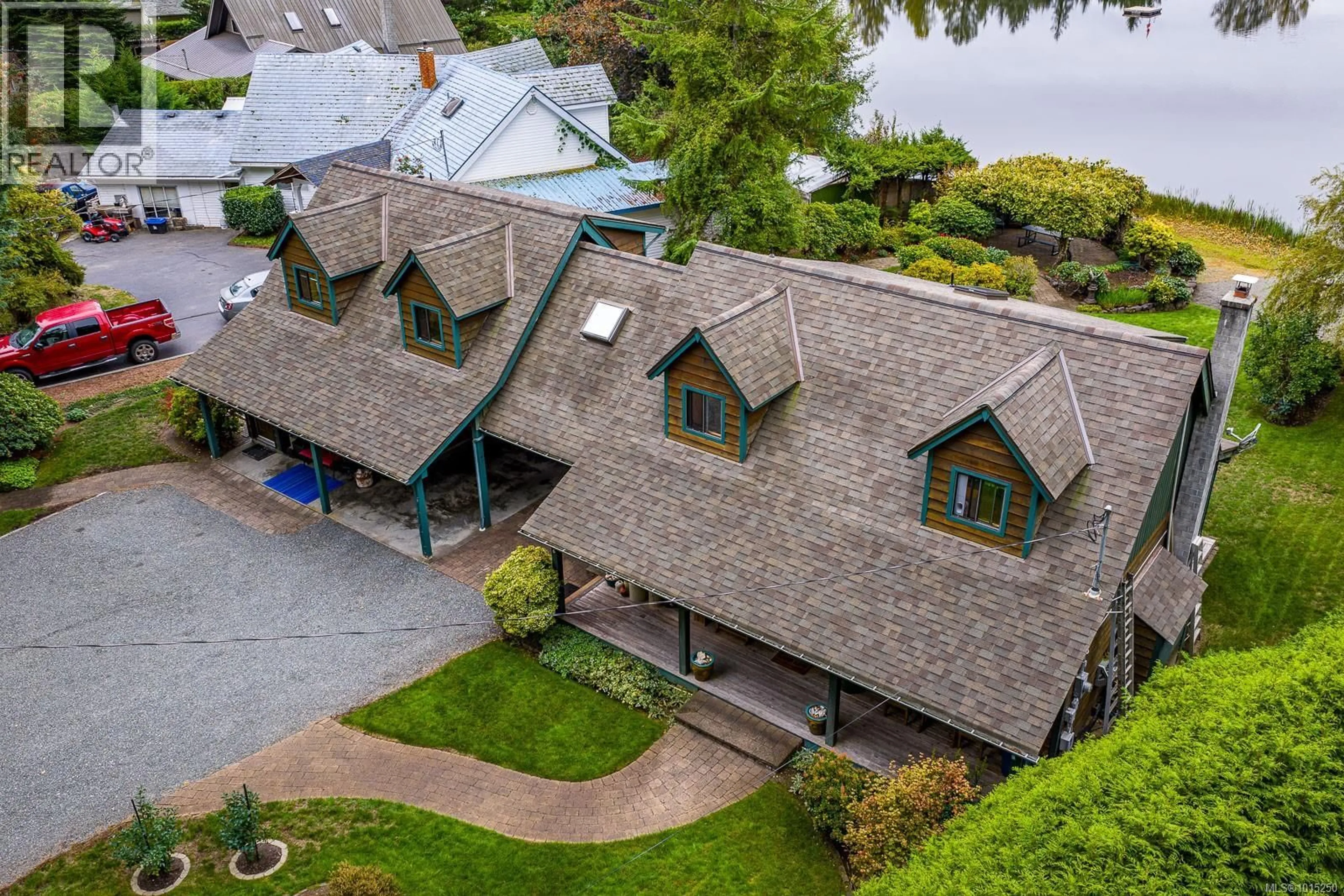 A pic from outside/outdoor area/front of a property/back of a property/a pic from drone, water/lake/river/ocean view for 9386 MARTIN PARK DRIVE, Black Creek British Columbia V9J1C4
