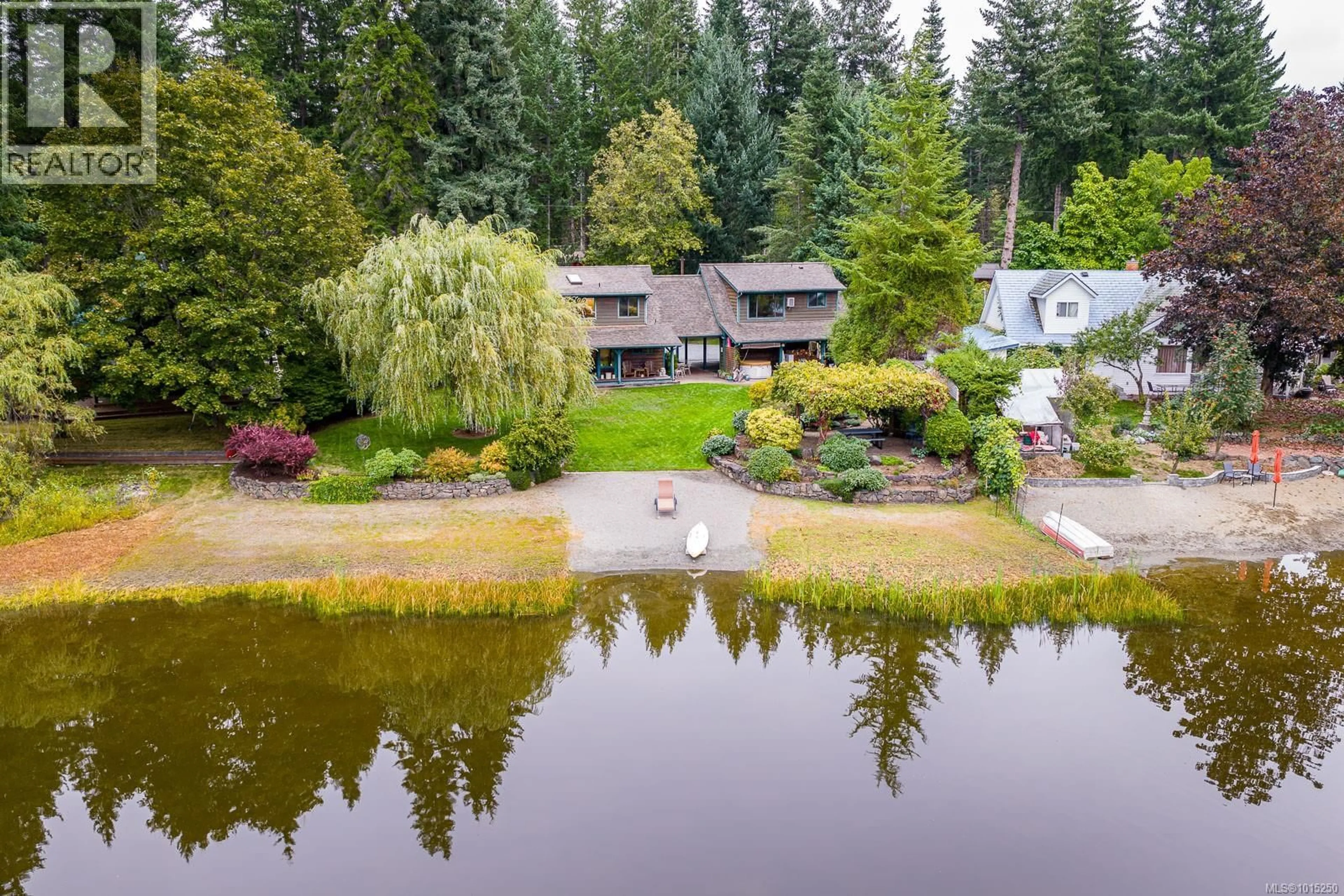 A pic from outside/outdoor area/front of a property/back of a property/a pic from drone, water/lake/river/ocean view for 9386 MARTIN PARK DRIVE, Black Creek British Columbia V9J1C4