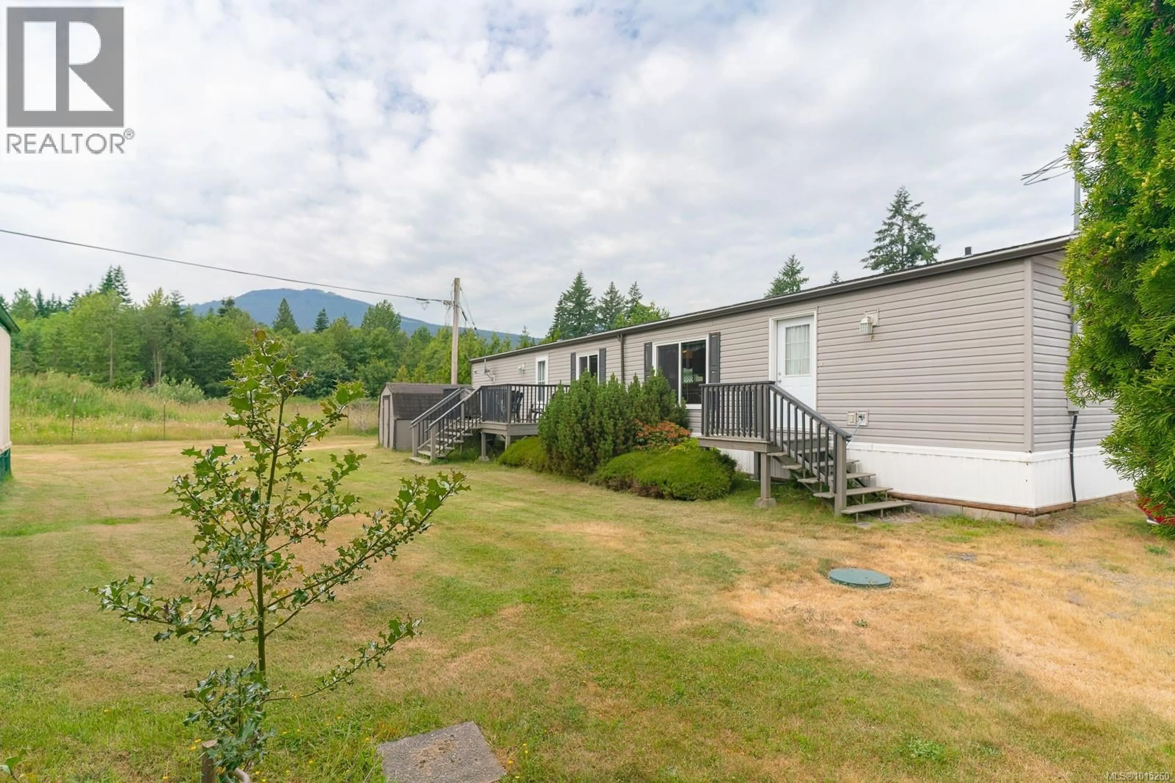A pic from outside/outdoor area/front of a property/back of a property/a pic from drone, mountain view for B - 10860 CHEMAINUS ROAD, Saltair British Columbia V9G2A5