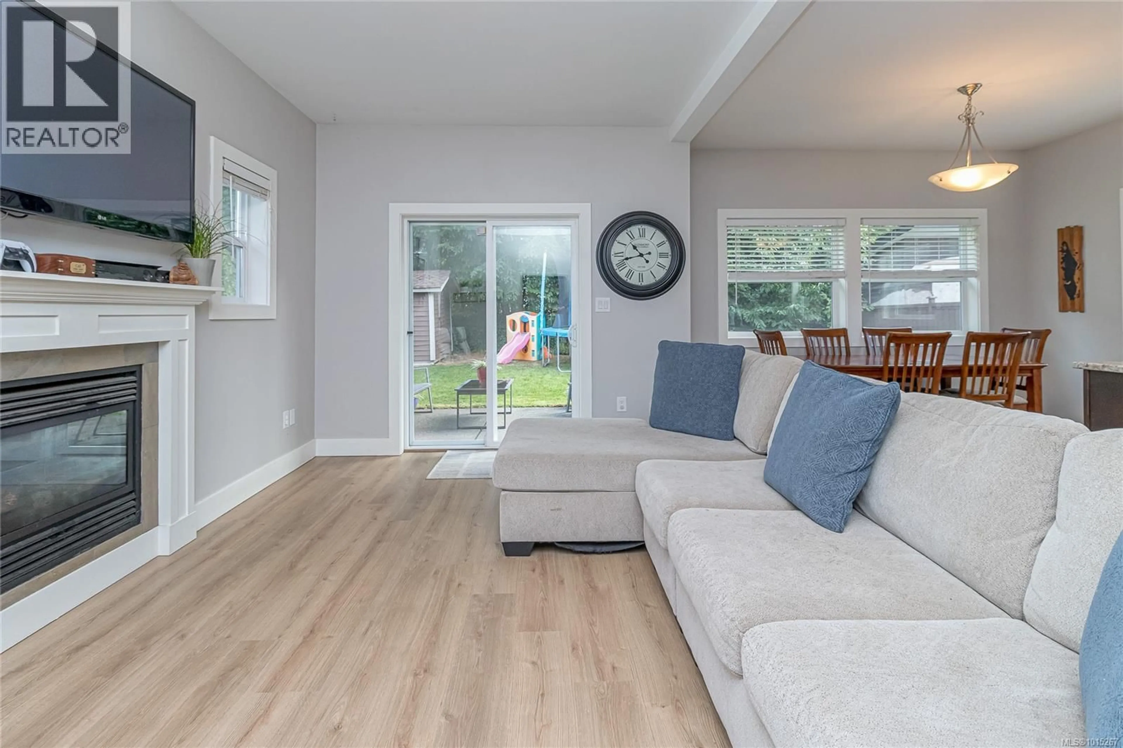 Living room with furniture, wood/laminate floor for 1043 SKYLAR CIRCLE, Shawnigan Lake British Columbia V0R2W3