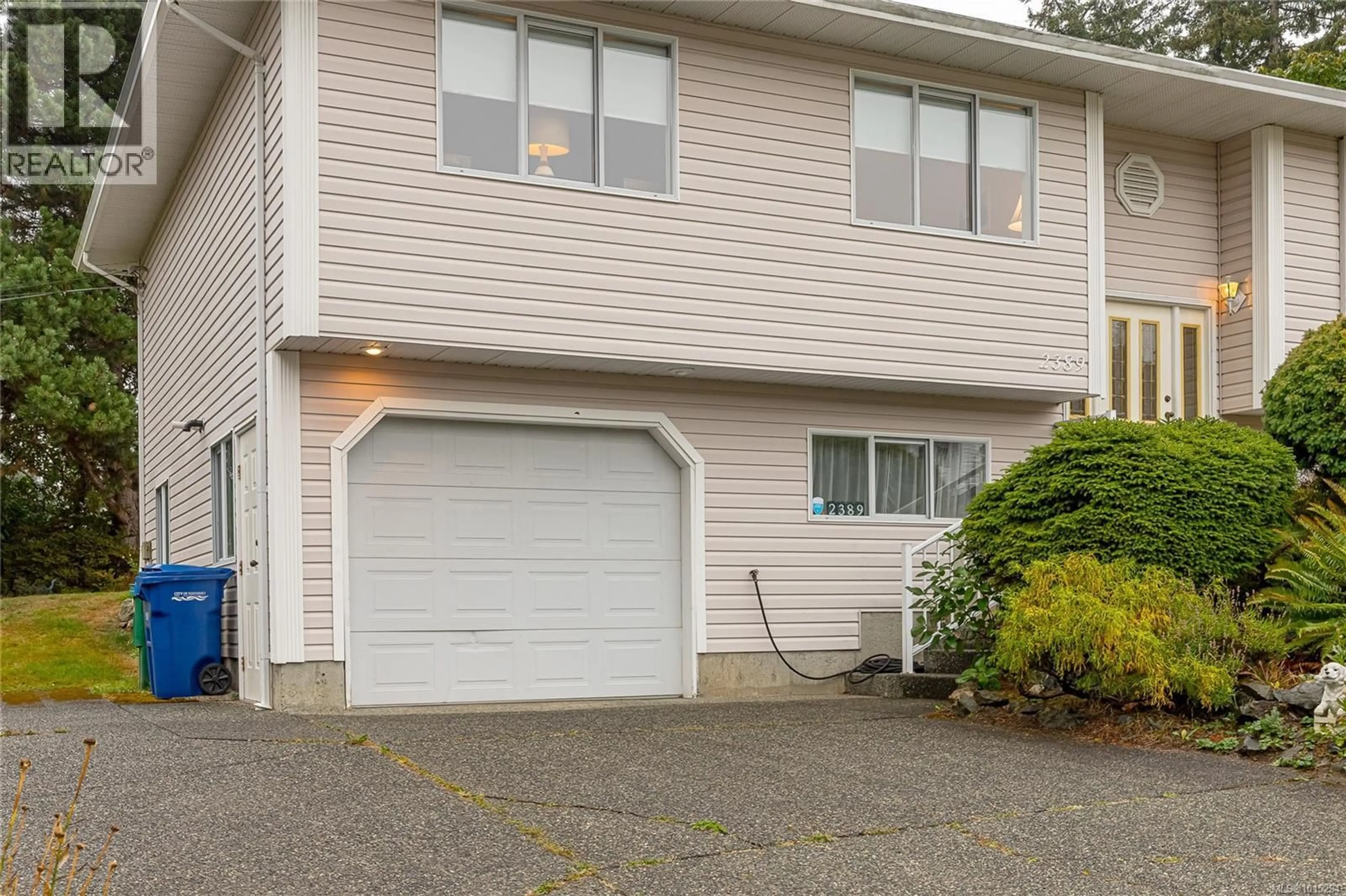 Home with vinyl exterior material, street for 2389 WESTHILL PLACE, Nanaimo British Columbia V9R6M9