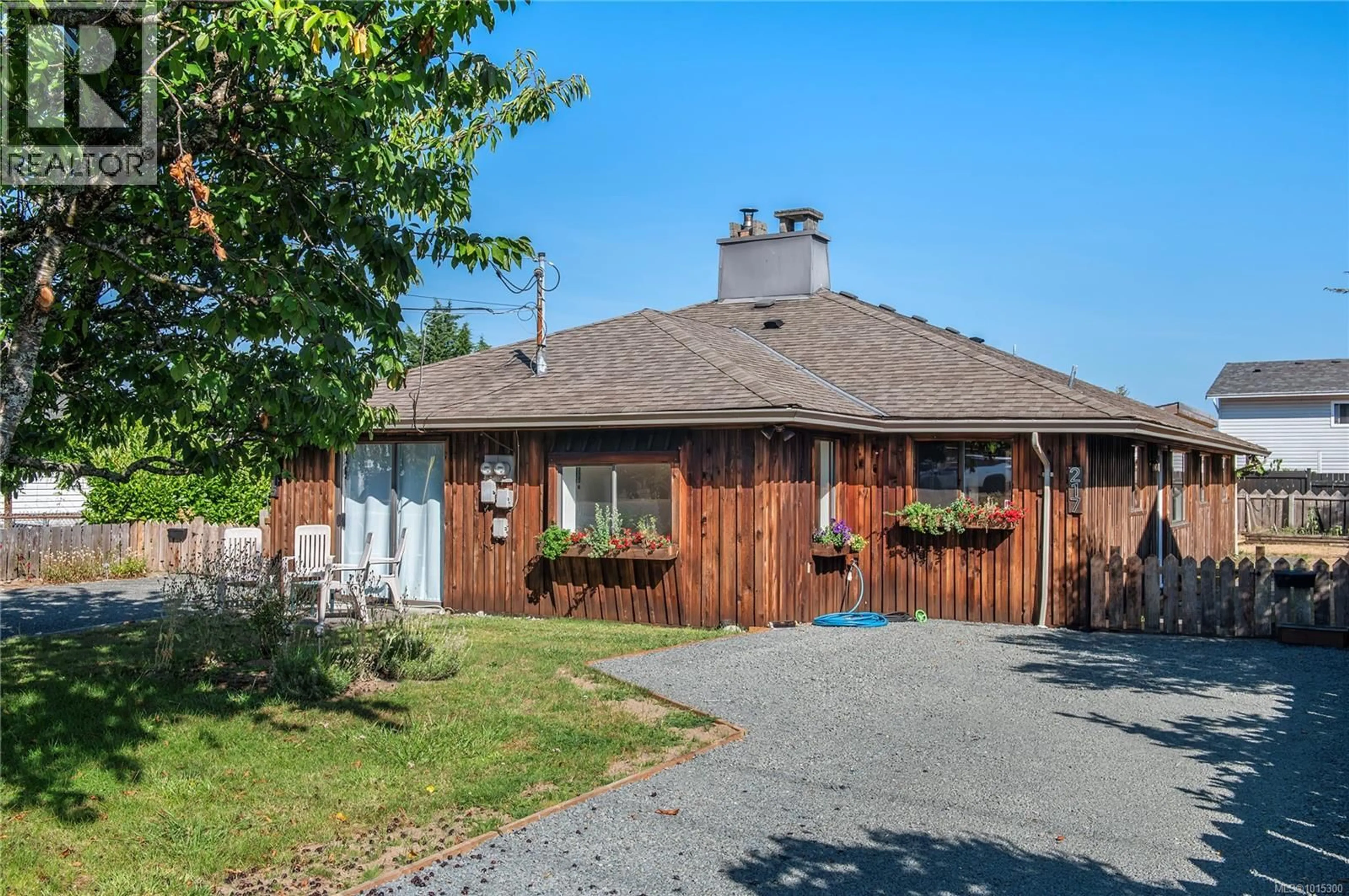 Home with brick exterior material, street for 217 LARWOOD ROAD, Campbell River British Columbia V9W1S3