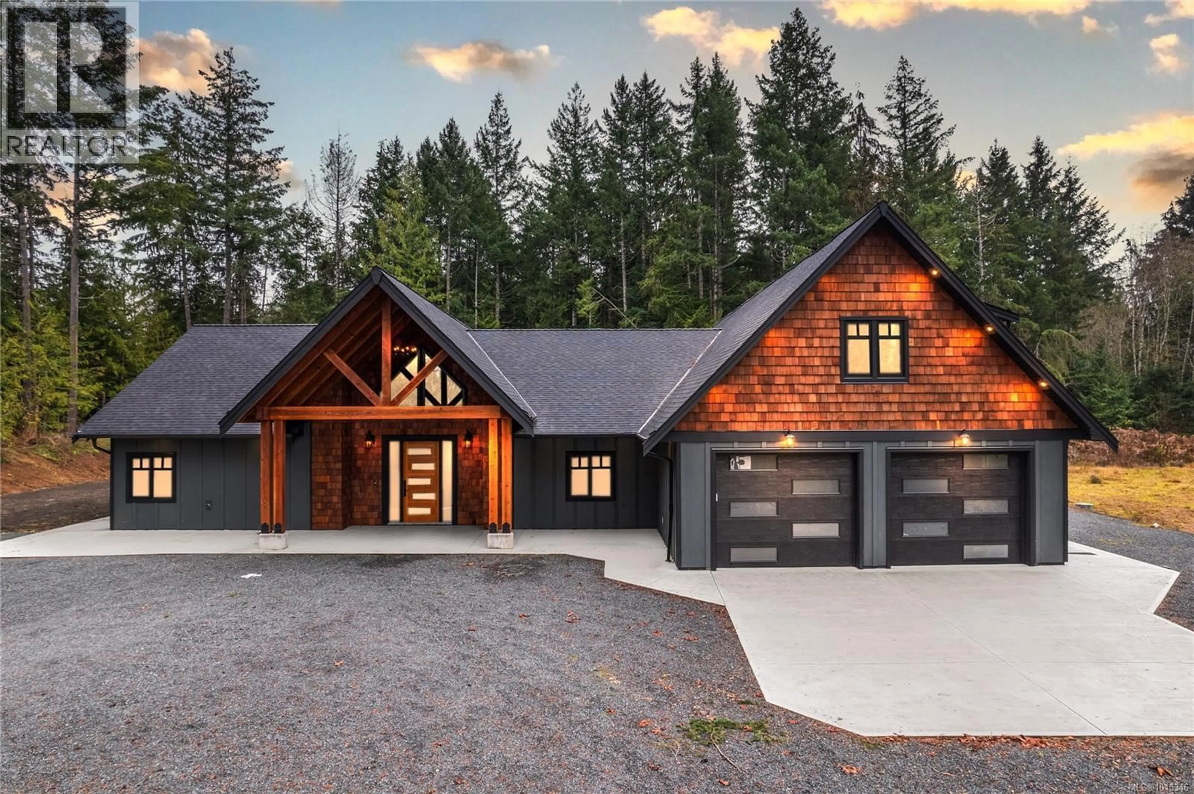 Home with brick exterior material, mountain view for 1940 TIMBERLAKE PLACE, Qualicum Beach British Columbia V9K2R6