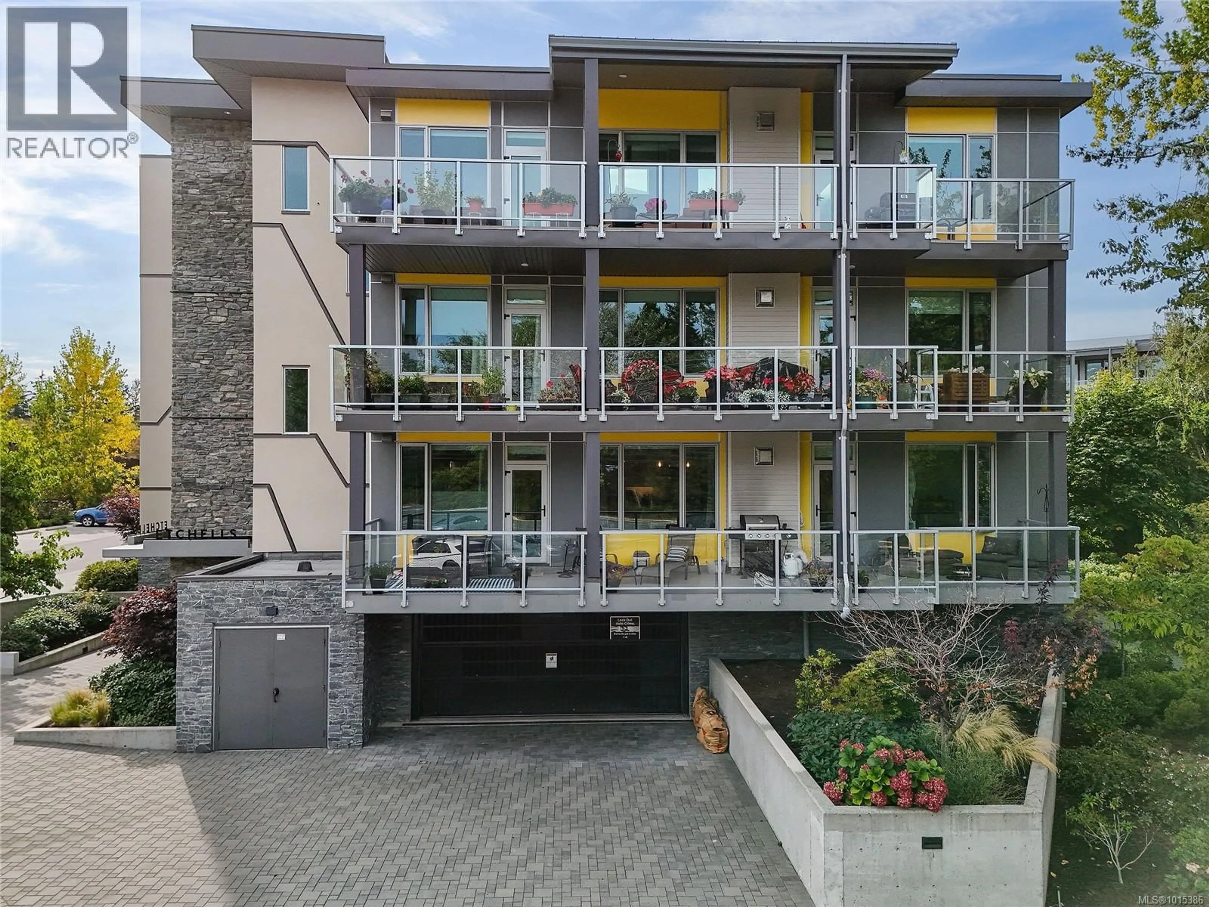 A pic from outside/outdoor area/front of a property/back of a property/a pic from drone, unknown for 206 - 10660 MCDONALD PARK ROAD, North Saanich British Columbia V8L5S7
