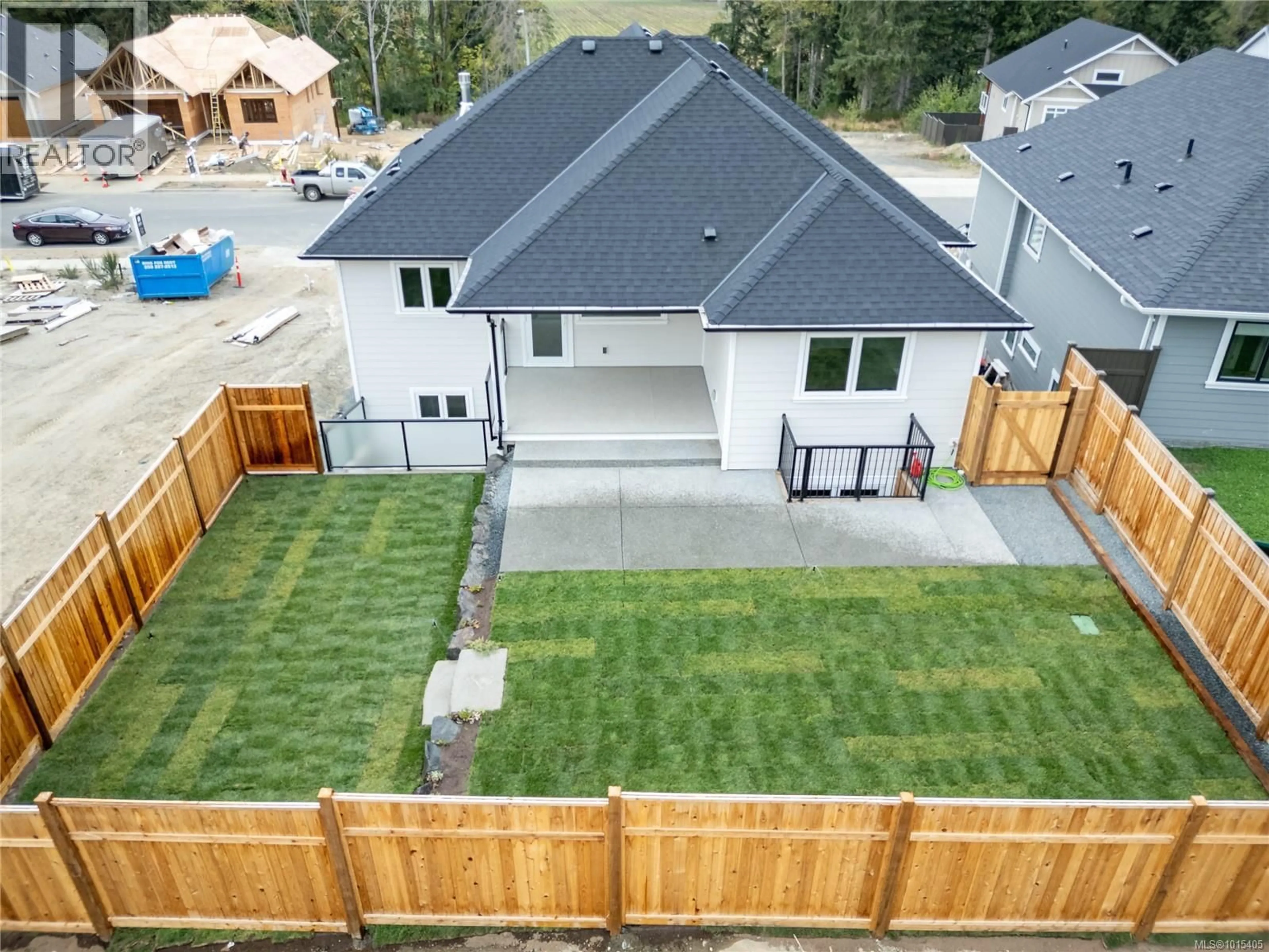 A pic from outside/outdoor area/front of a property/back of a property/a pic from drone, mountain view for 1783 CROWN ISLE BOULEVARD, Courtenay British Columbia V9N9X5