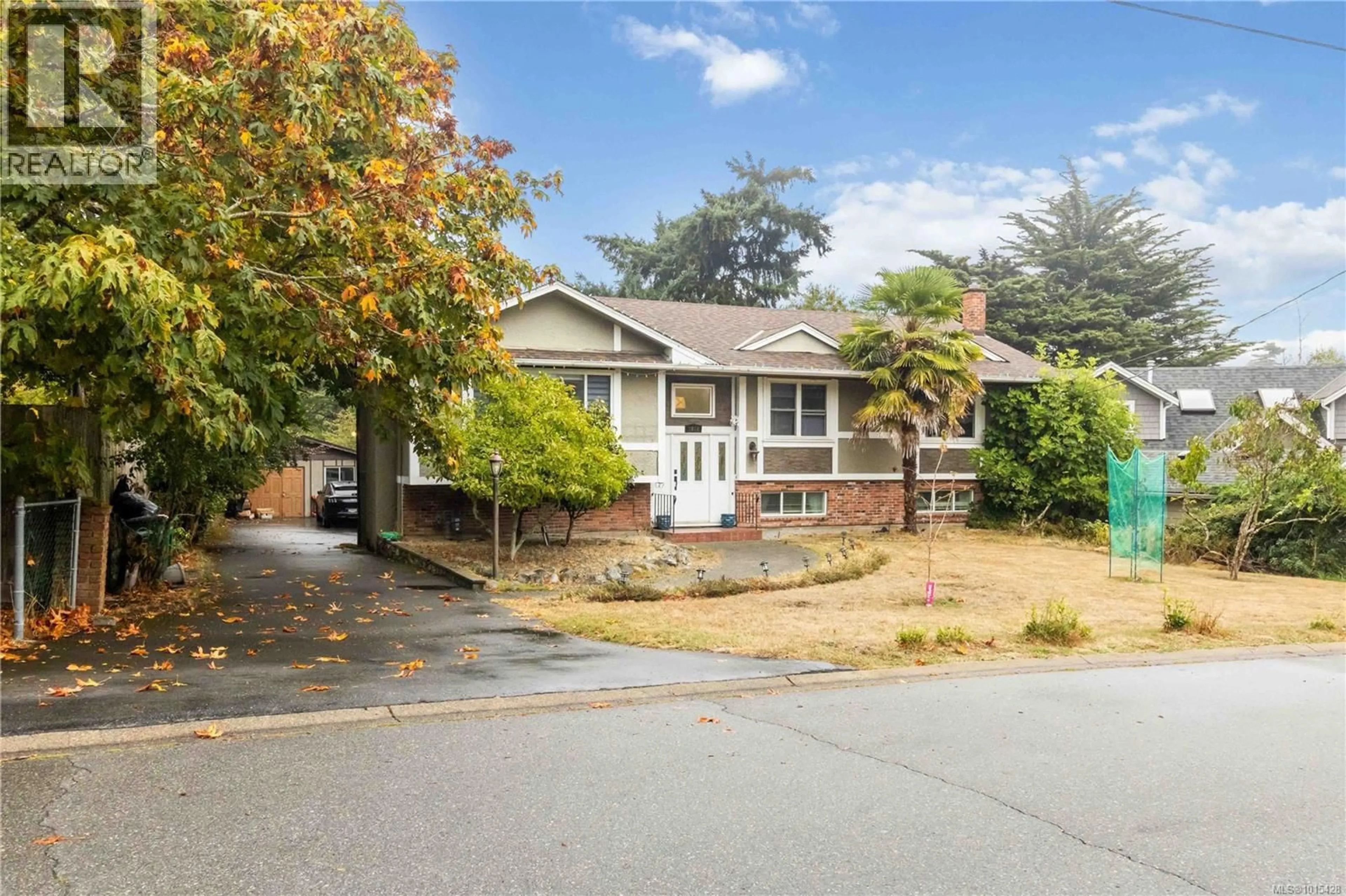 A pic from outside/outdoor area/front of a property/back of a property/a pic from drone, street for 1812 EL SERENO DRIVE, Saanich British Columbia V8N2S4