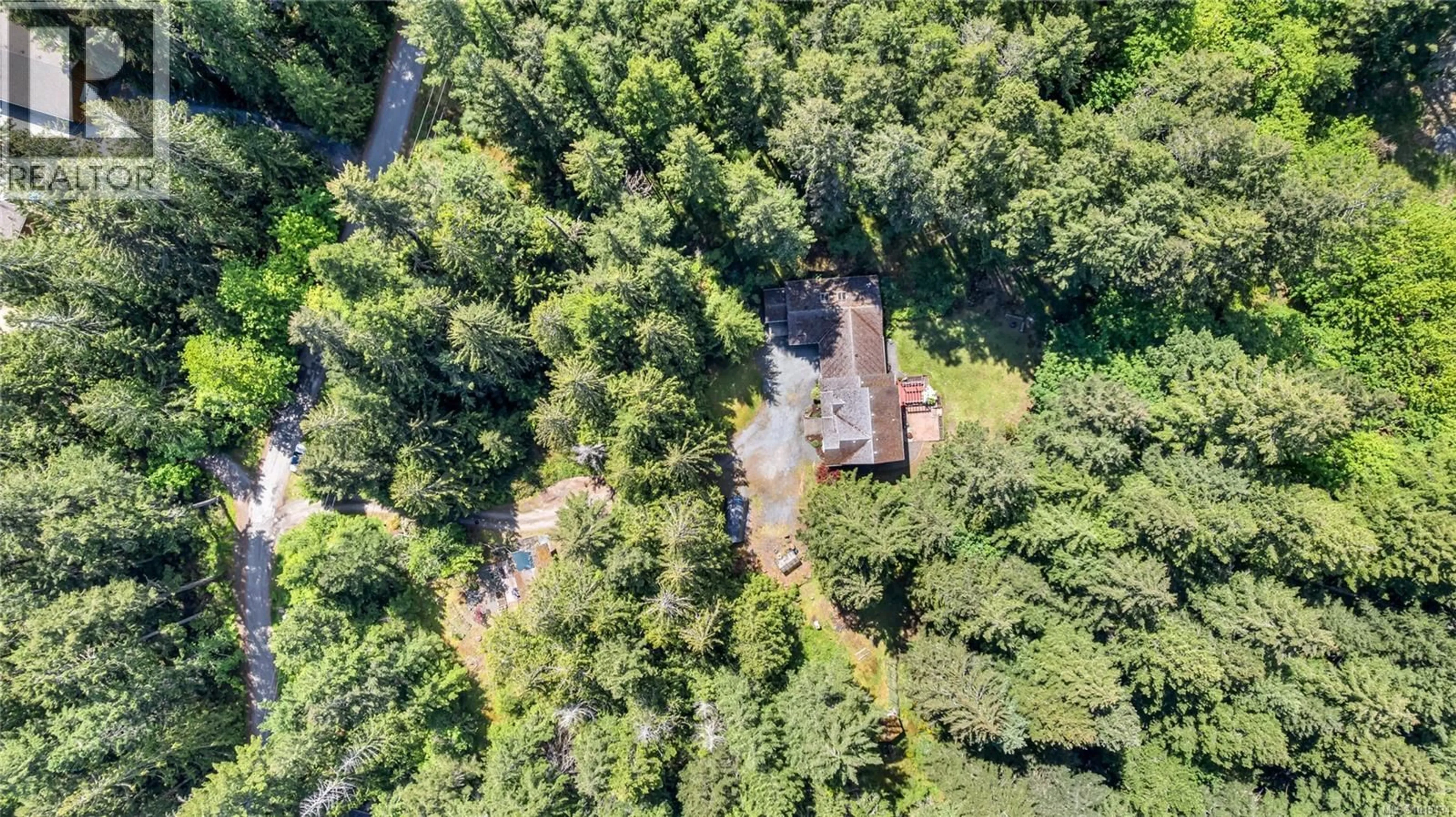 A pic from outside/outdoor area/front of a property/back of a property/a pic from drone, forest/trees view for 1850 LAKEWOOD ROAD, Shawnigan Lake British Columbia V0R2W0
